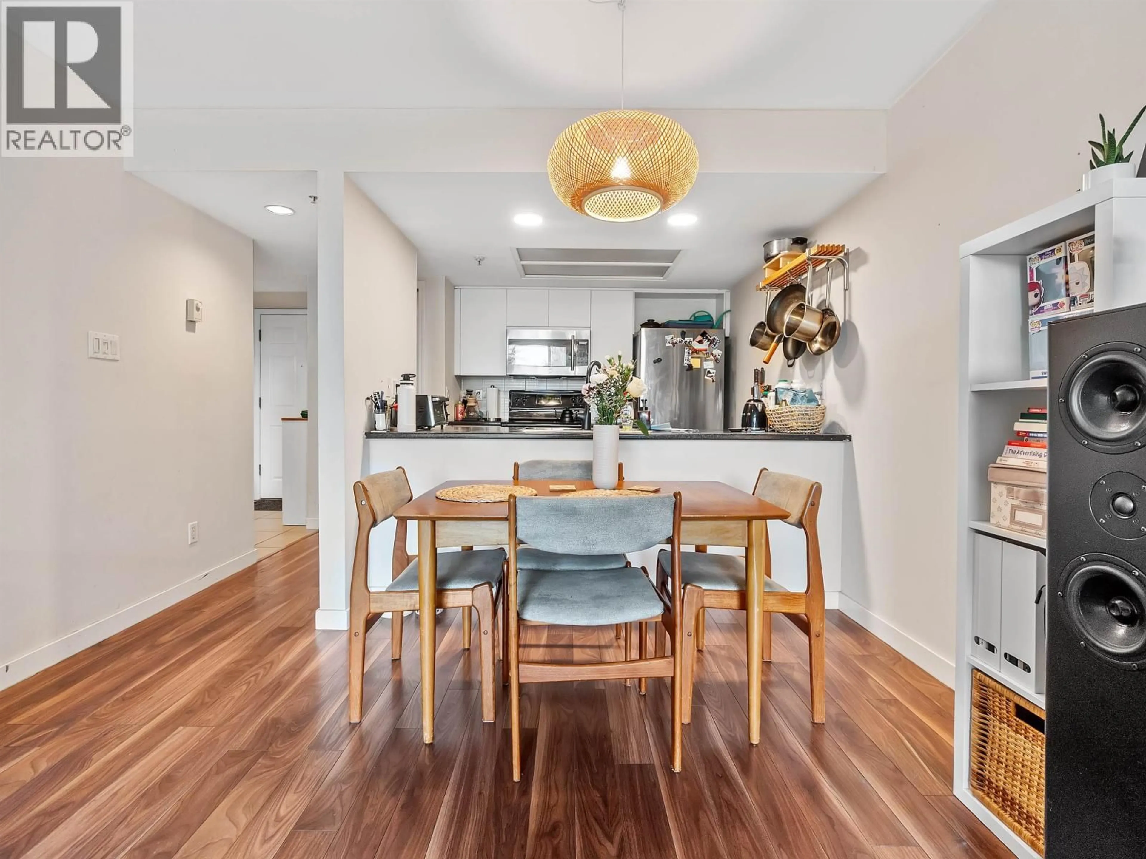 Open concept kitchen, wood/laminate floor for 404 - 1159 MAIN STREET, Vancouver British Columbia V6A4B6
