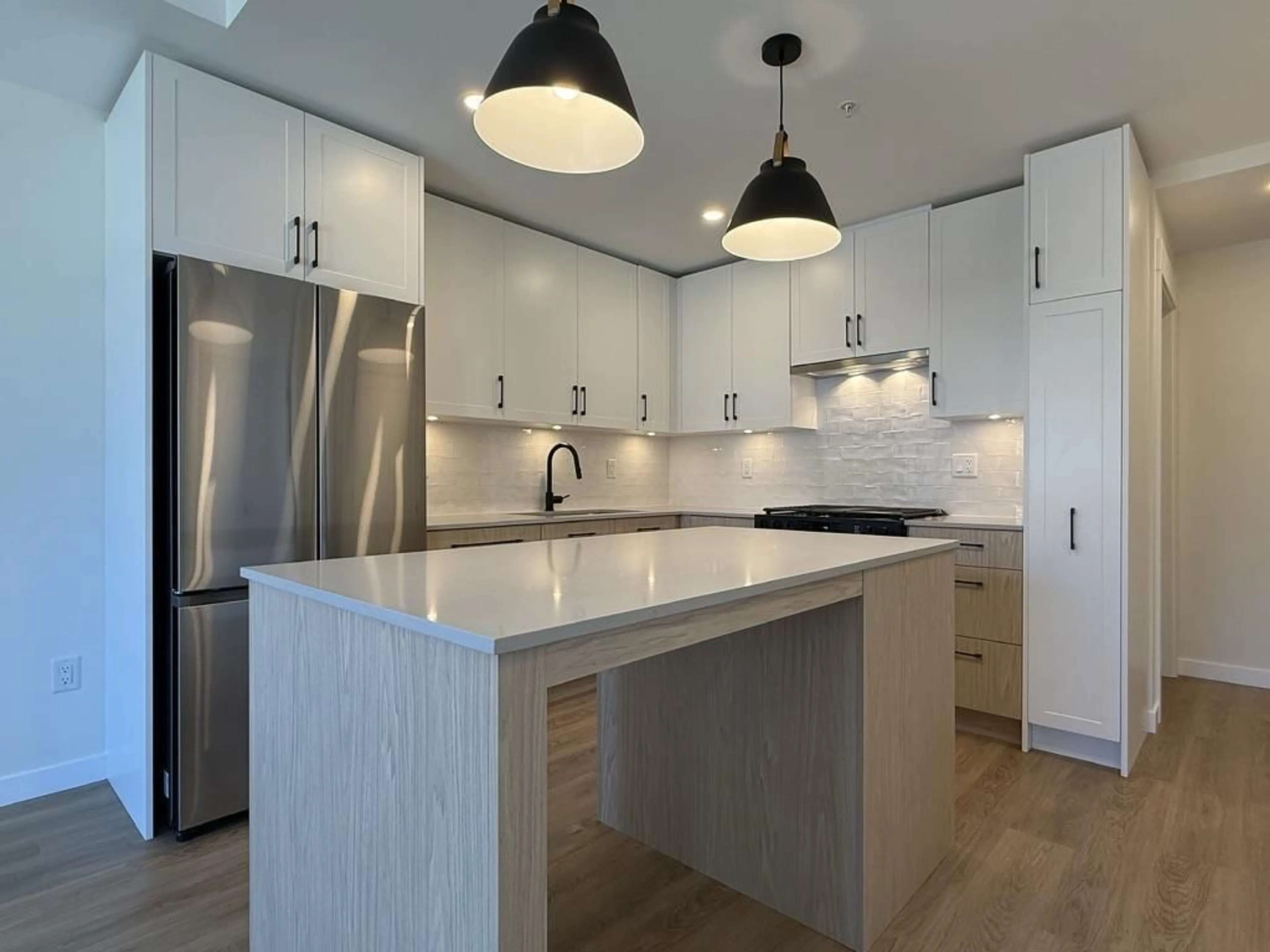 Open concept kitchen, unknown for 204 - 27218 ALDERGROVE TOWN CENTRE, Langley British Columbia V4W0E4