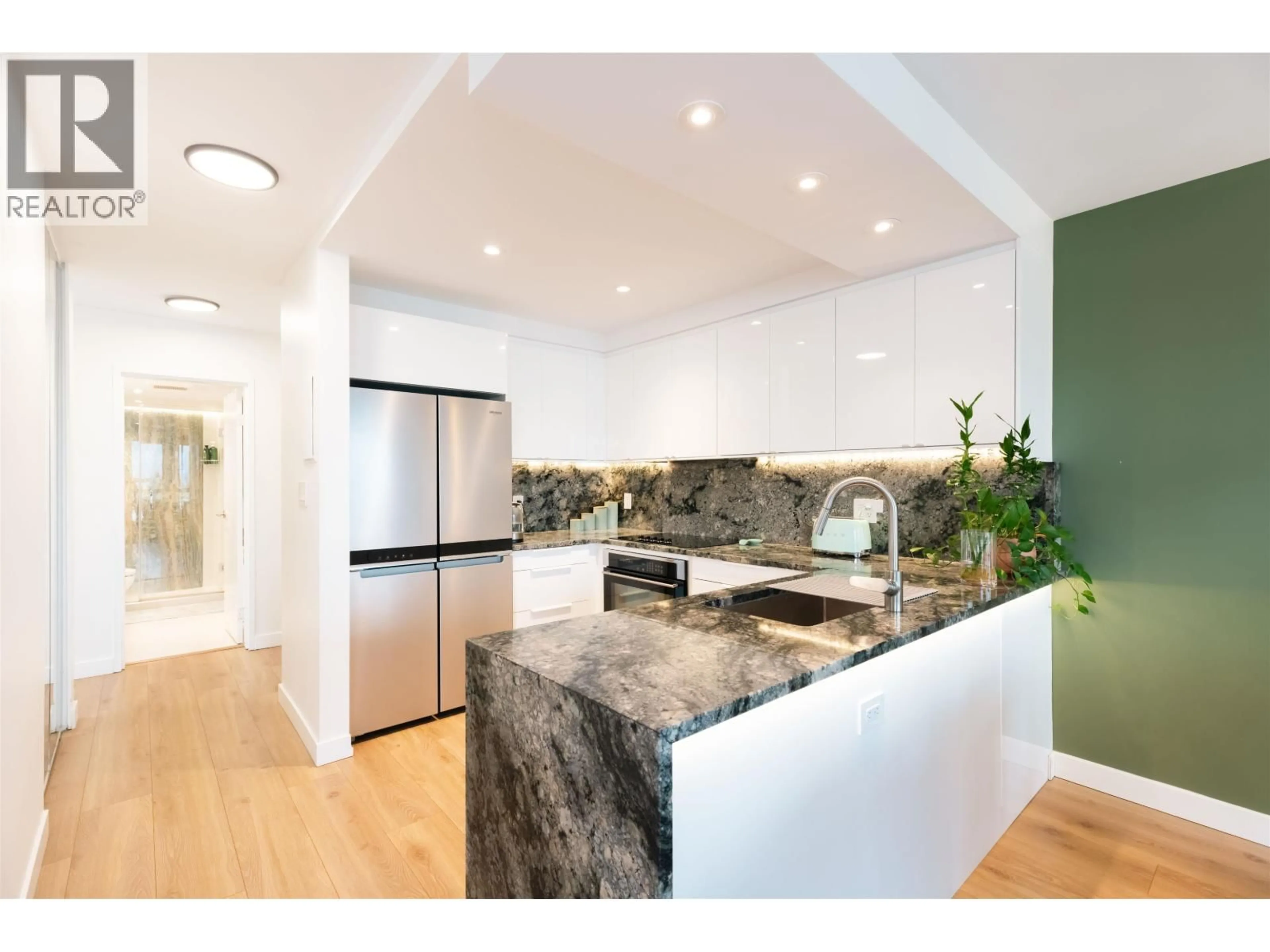 Open concept kitchen, ceramic/tile floor for 705 - 444 LONSDALE AVENUE, North Vancouver British Columbia V7M3H5