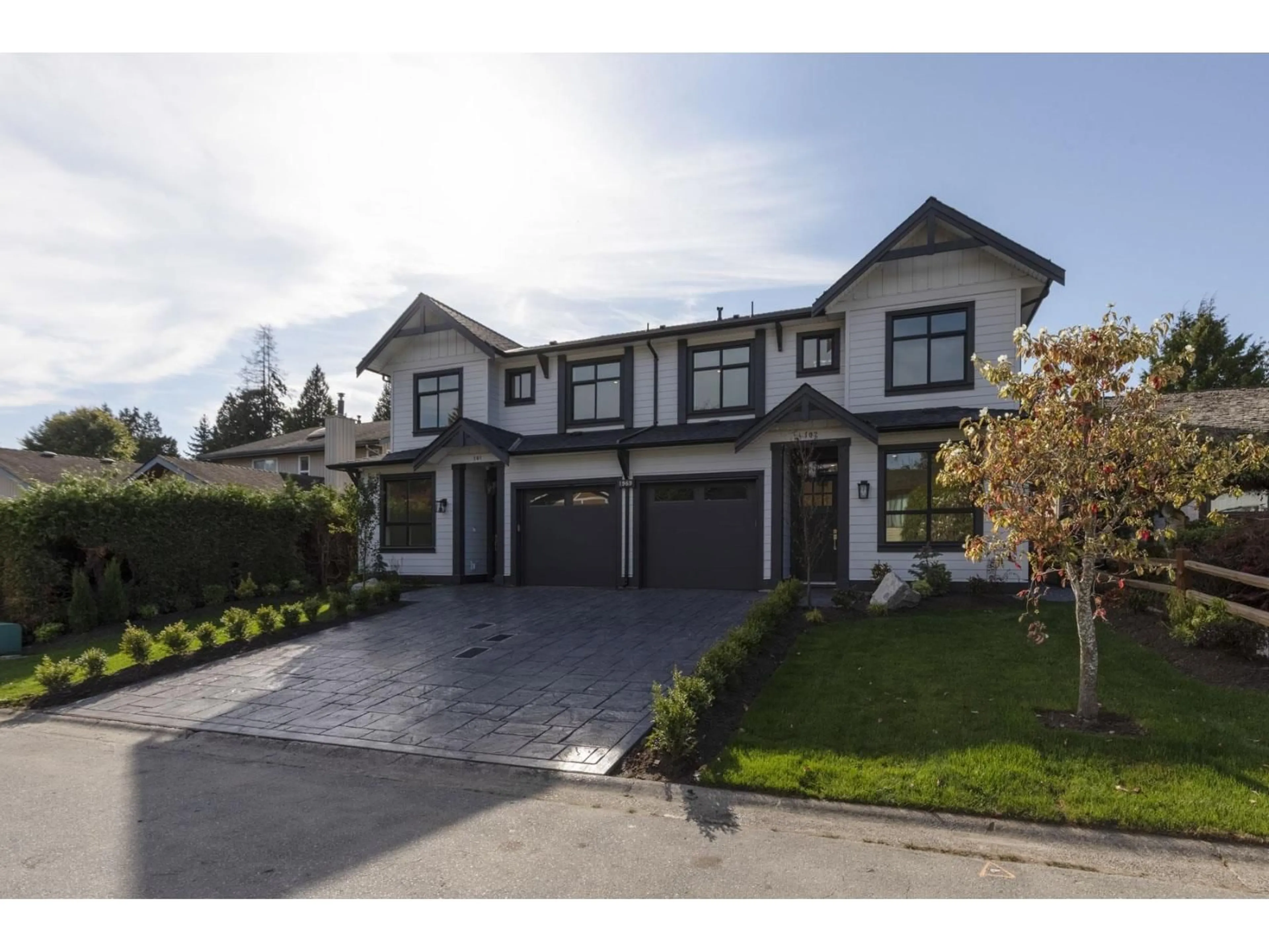 Home with brick exterior material, street for 102 - 1969 148A, Surrey British Columbia V4A6R6