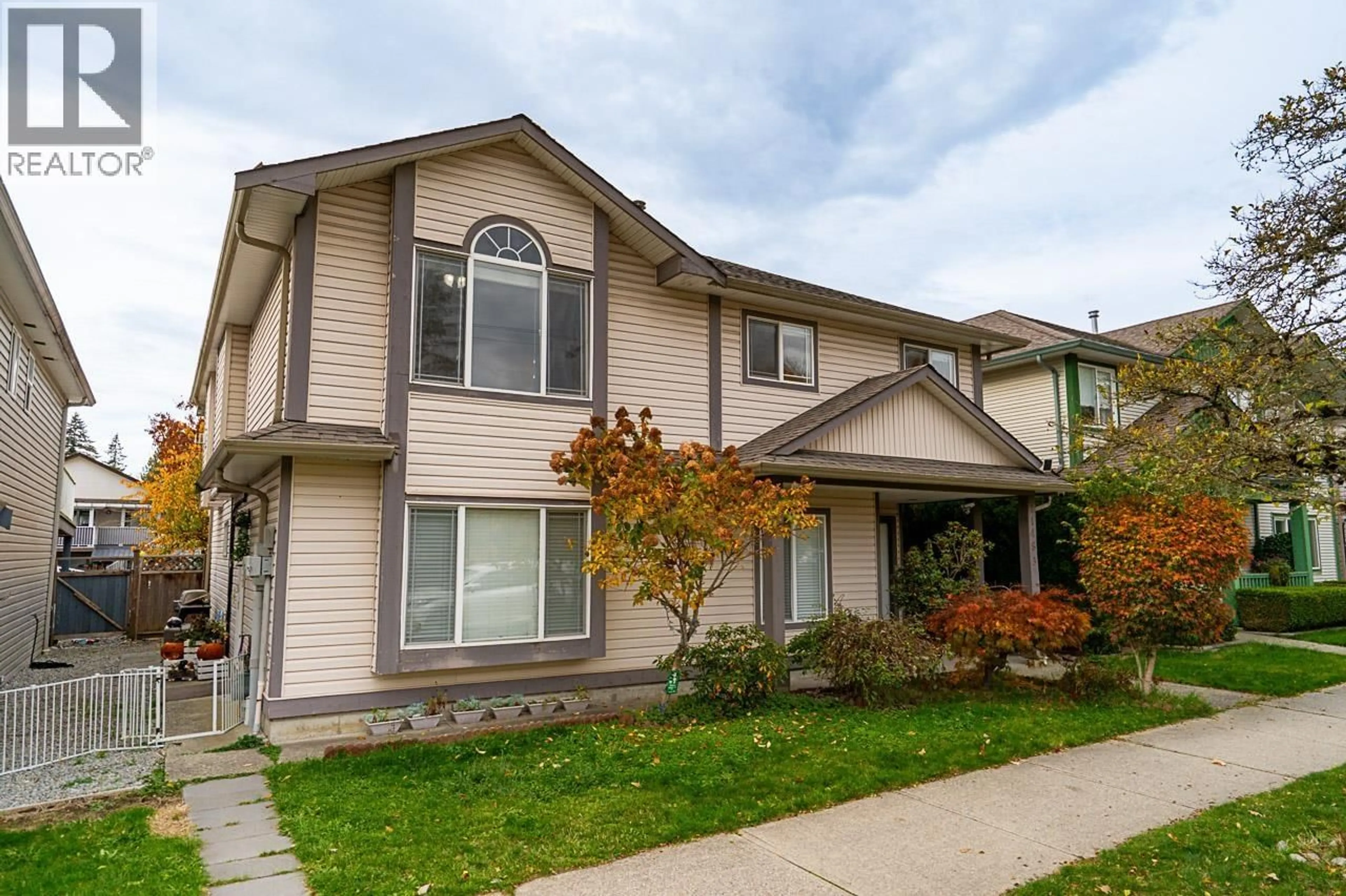 Home with vinyl exterior material, street for 11483 240 STREET, Maple Ridge British Columbia V2W1A3