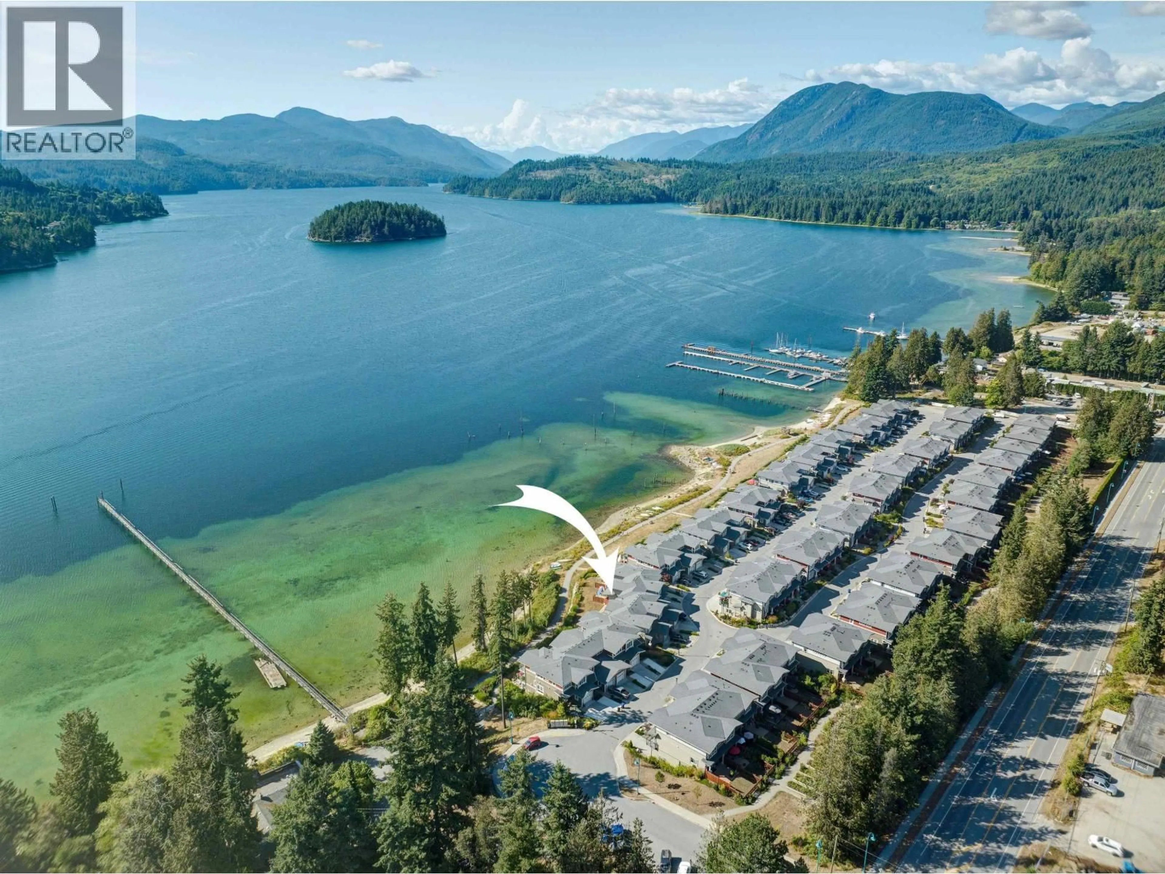 A pic from outside/outdoor area/front of a property/back of a property/a pic from drone, water/lake/river/ocean view for 5917 BEACHGATE LANE, Sechelt British Columbia V7Z0S3