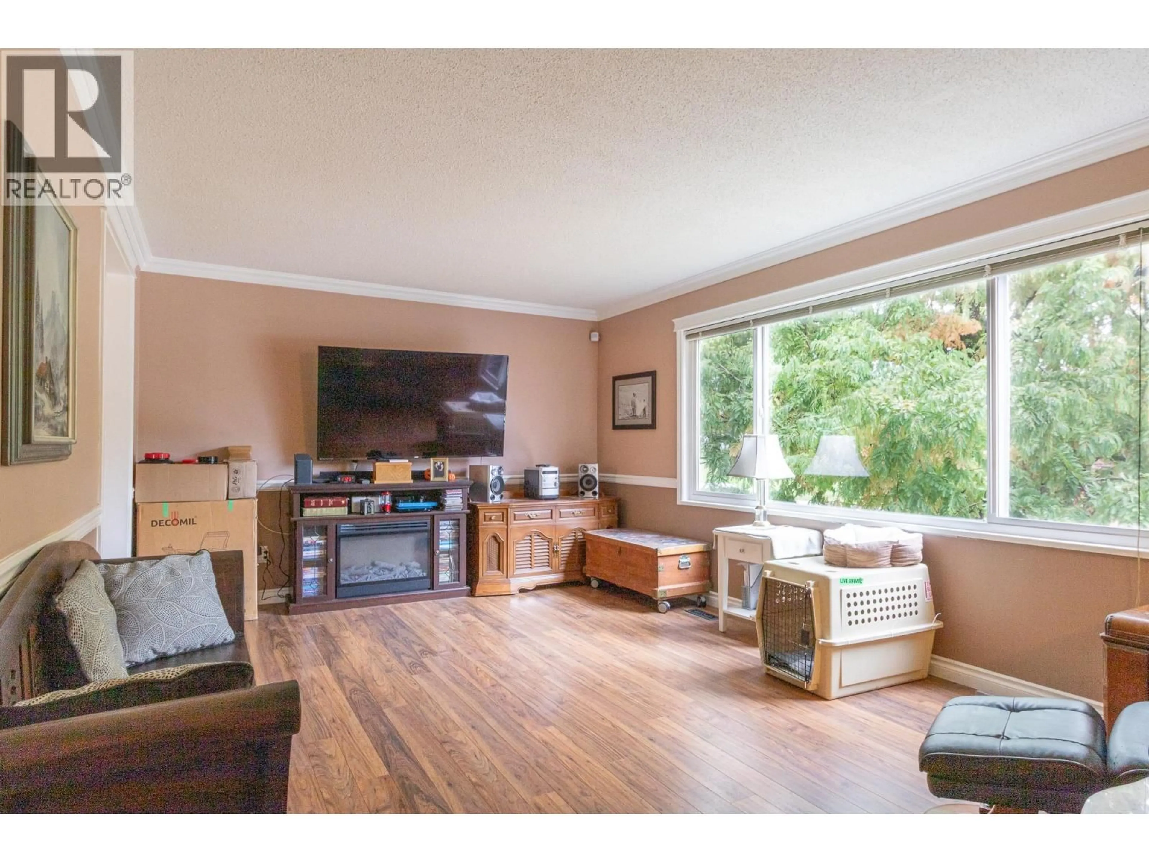 Living room with furniture, wood/laminate floor for 11819 230 STREET, Maple Ridge British Columbia V2X6R3
