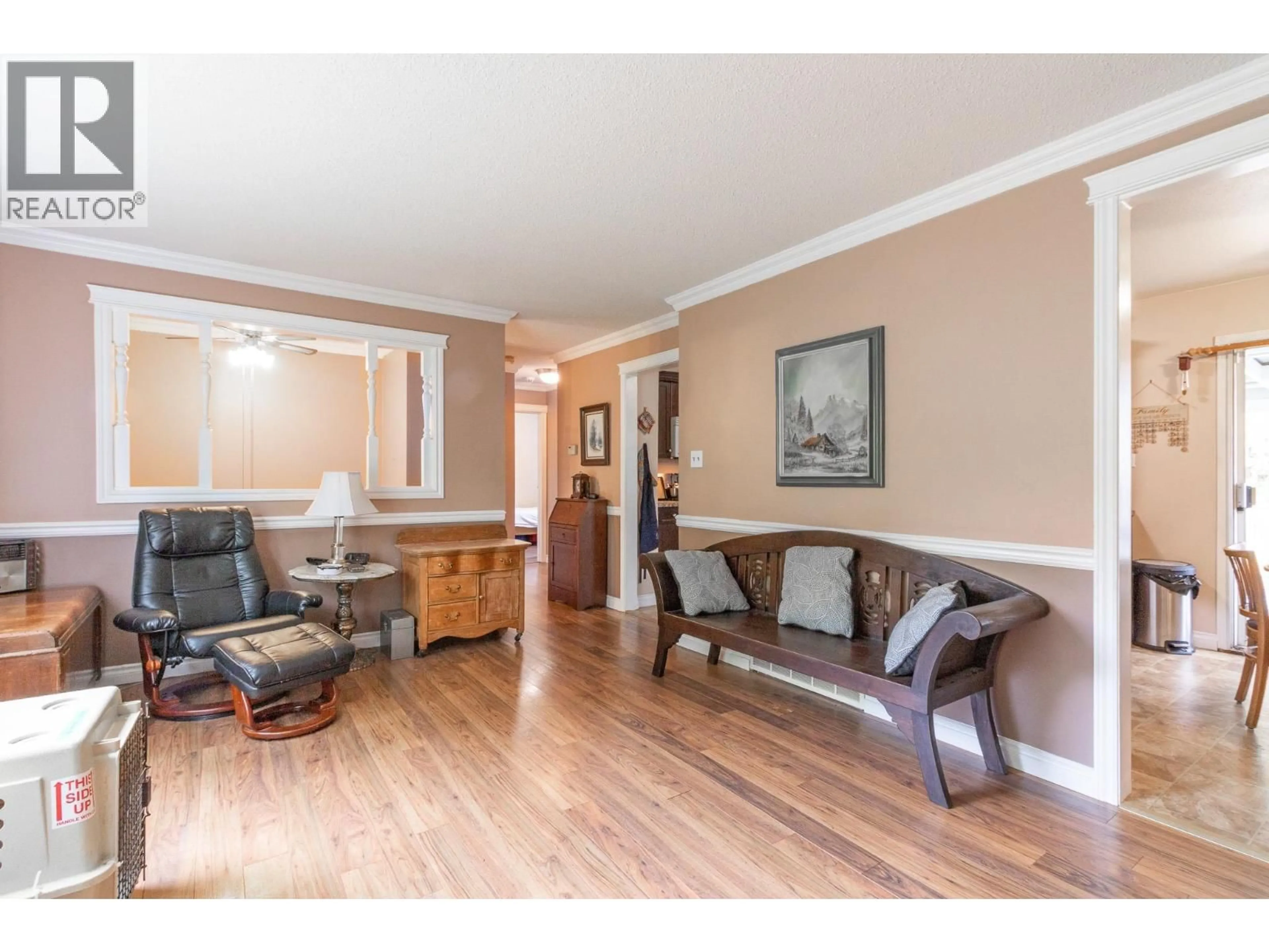 Living room with furniture, wood/laminate floor for 11819 230 STREET, Maple Ridge British Columbia V2X6R3