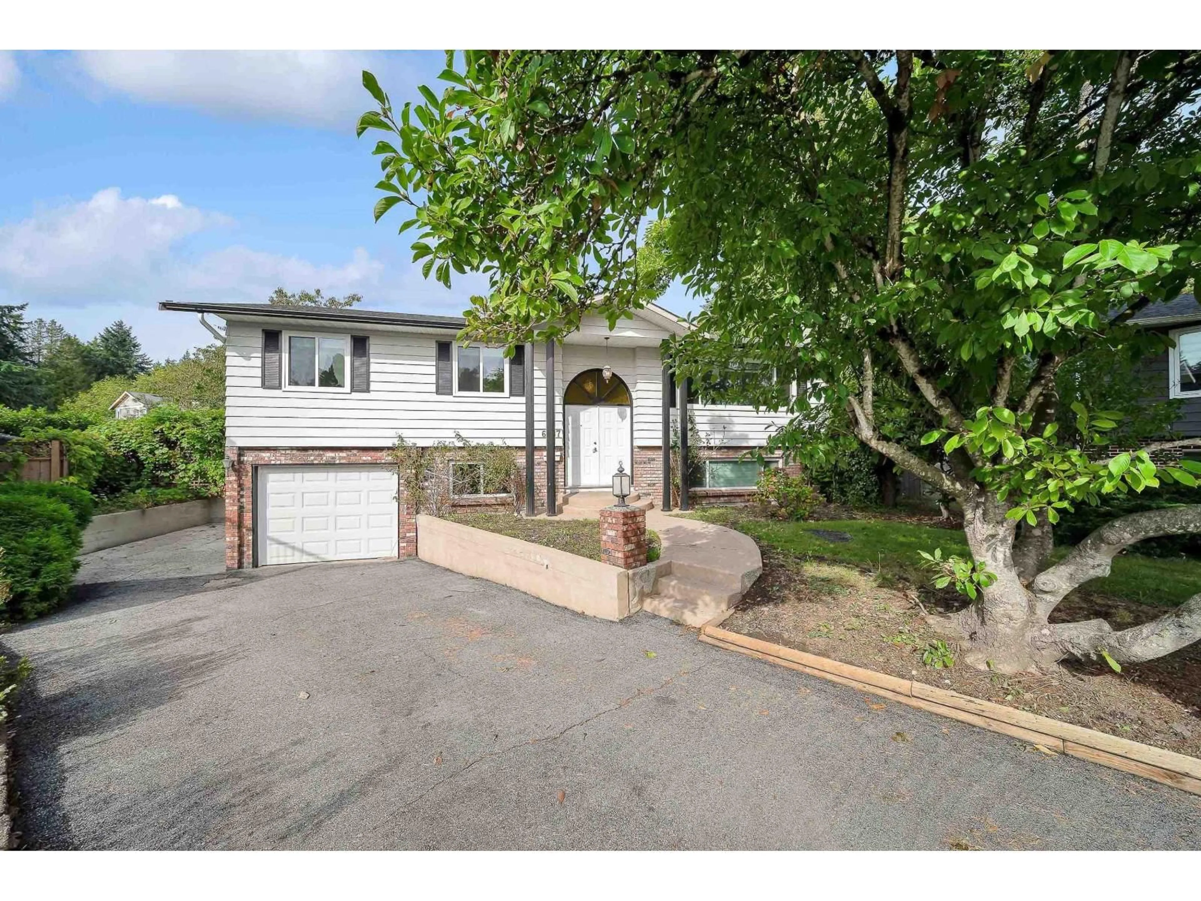 A pic from outside/outdoor area/front of a property/back of a property/a pic from drone, street for 6987 CARIBOU, Delta British Columbia V4E2B9