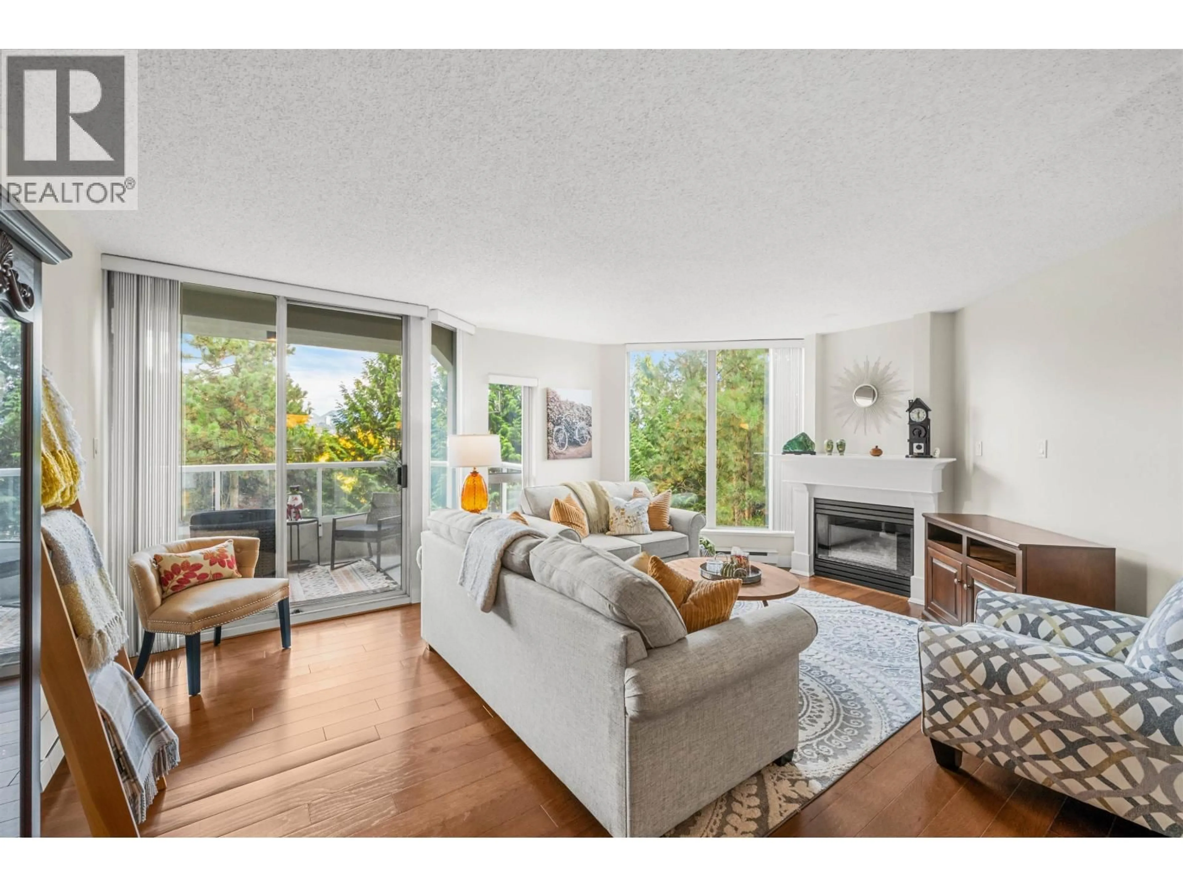 Living room with furniture, unknown for 404 - 71 JAMIESON COURT, New Westminster British Columbia V3L5R4