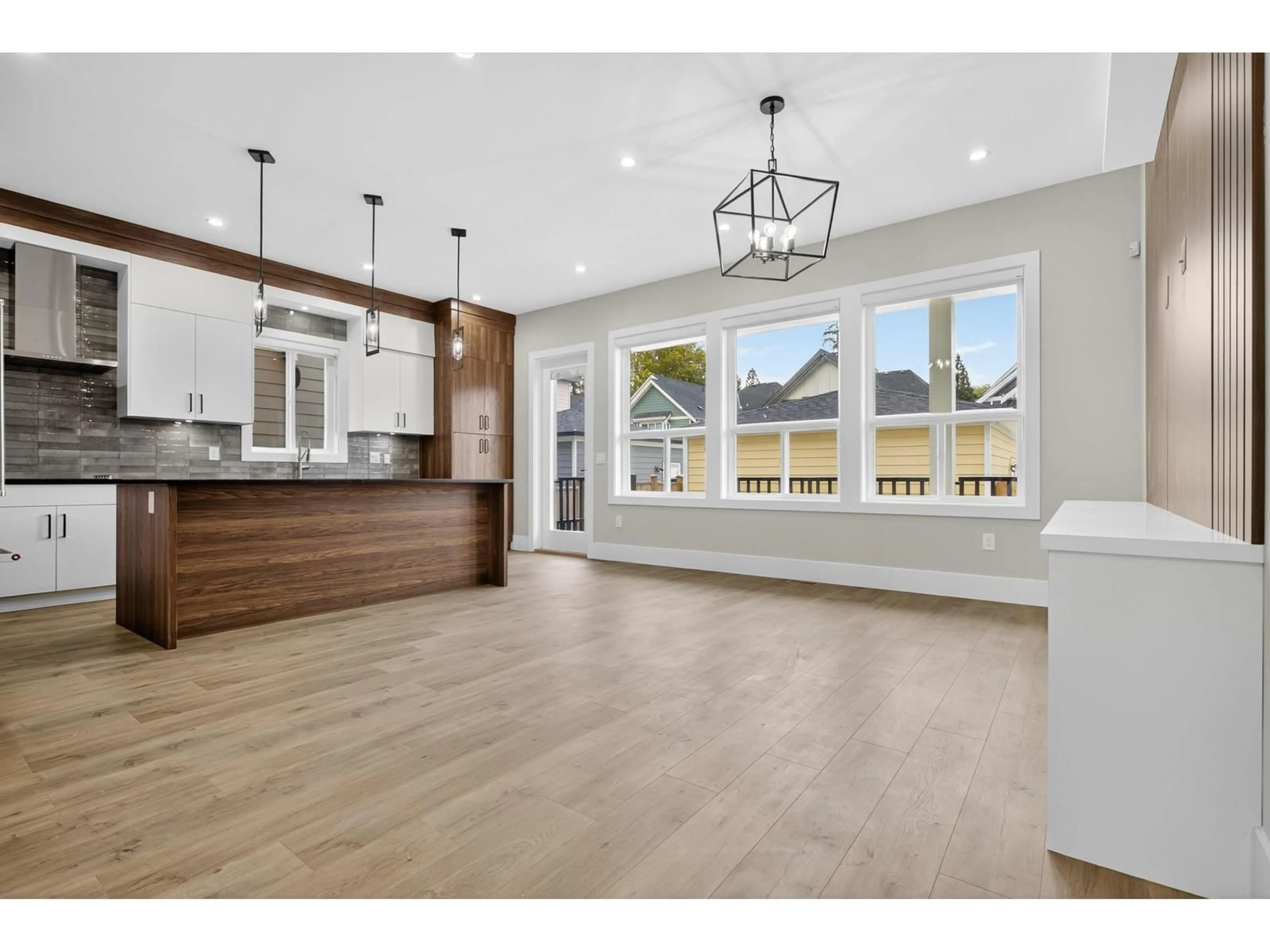 Open concept kitchen, wood/laminate floor for 17136 1, Surrey British Columbia V3Z9R2