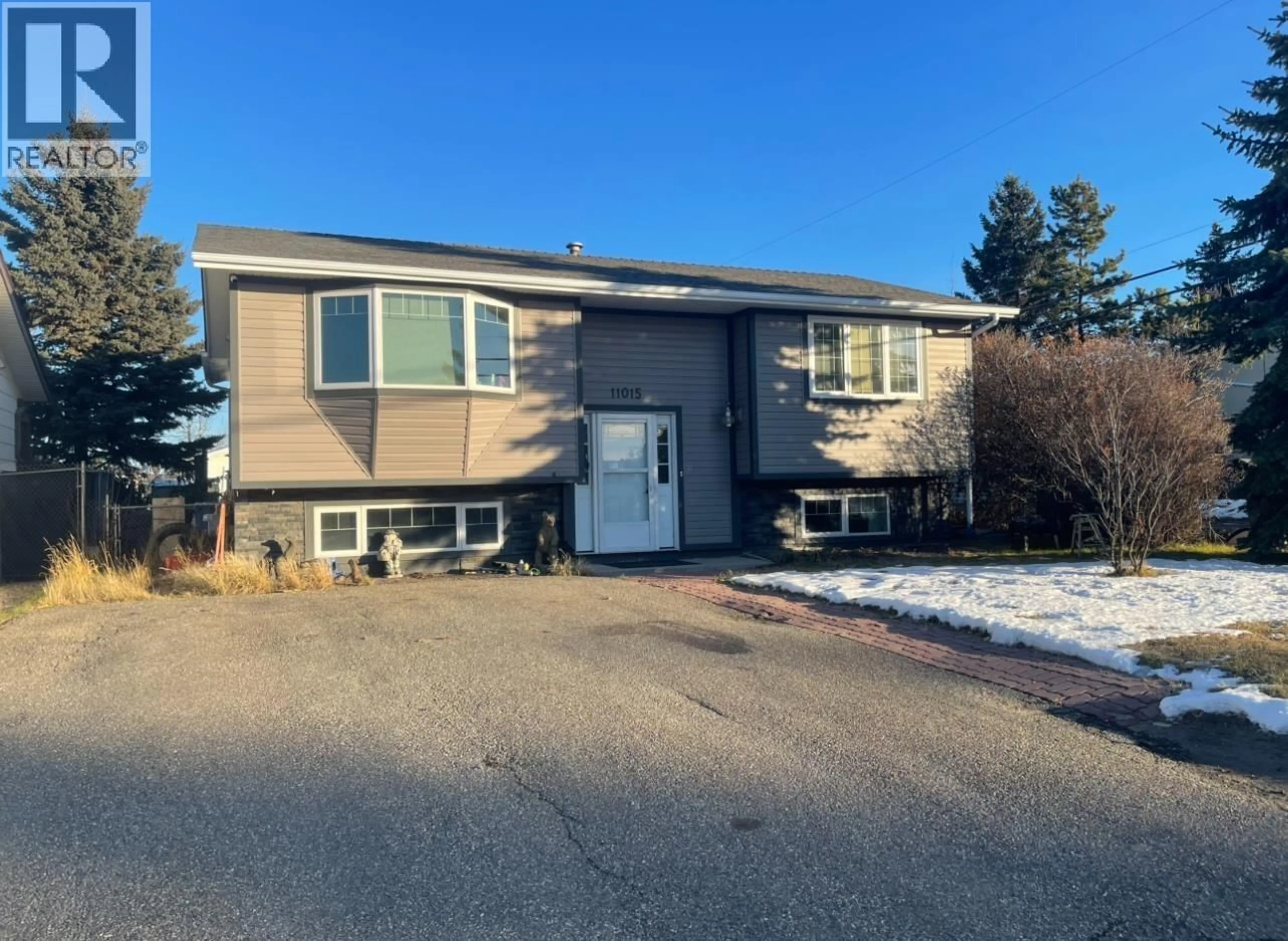 Home with vinyl exterior material, street for 11015 102 STREET, Fort St. John British Columbia V1J4C2