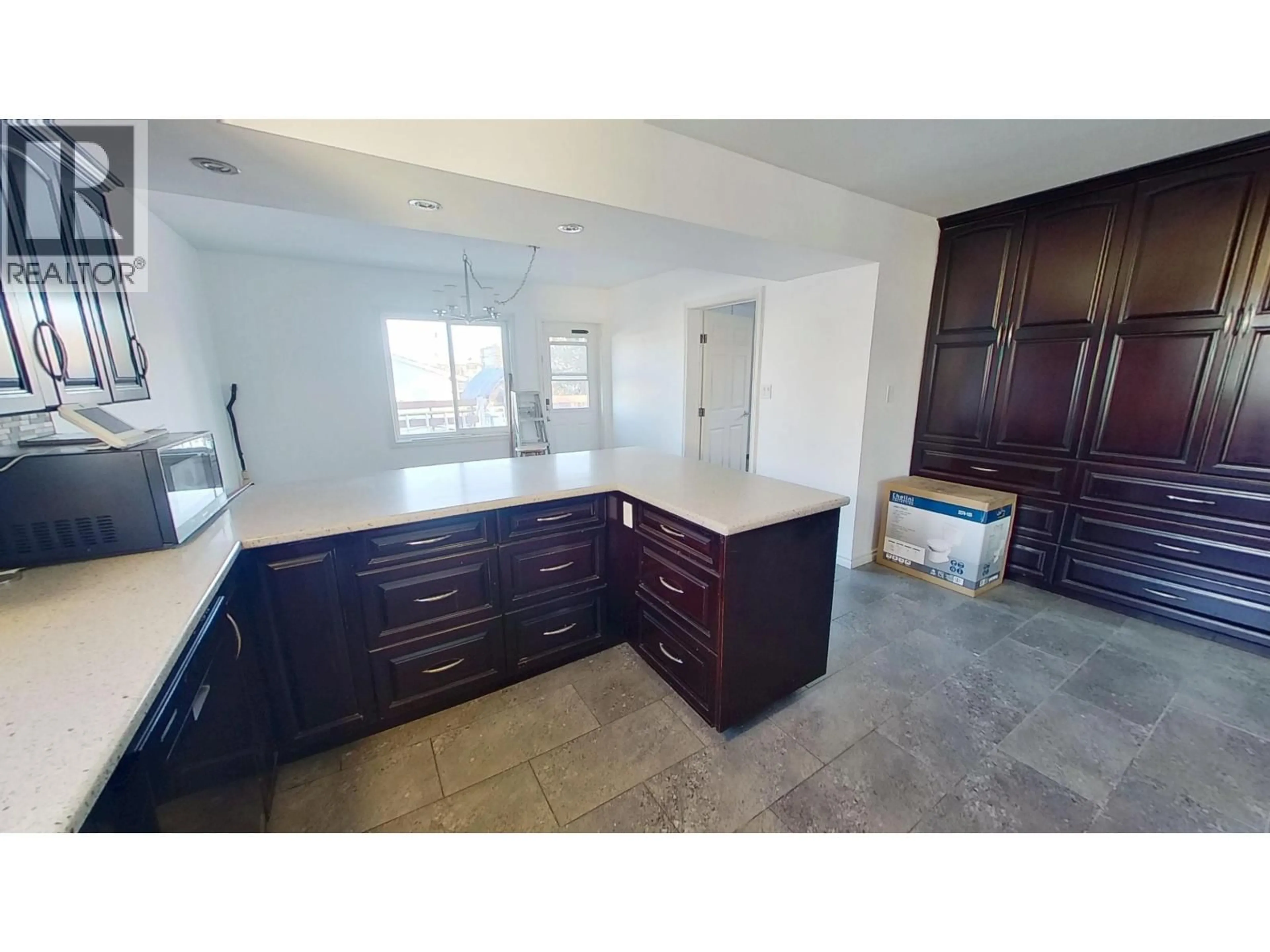 Open concept kitchen, ceramic/tile floor for 11015 102 STREET, Fort St. John British Columbia V1J4C2