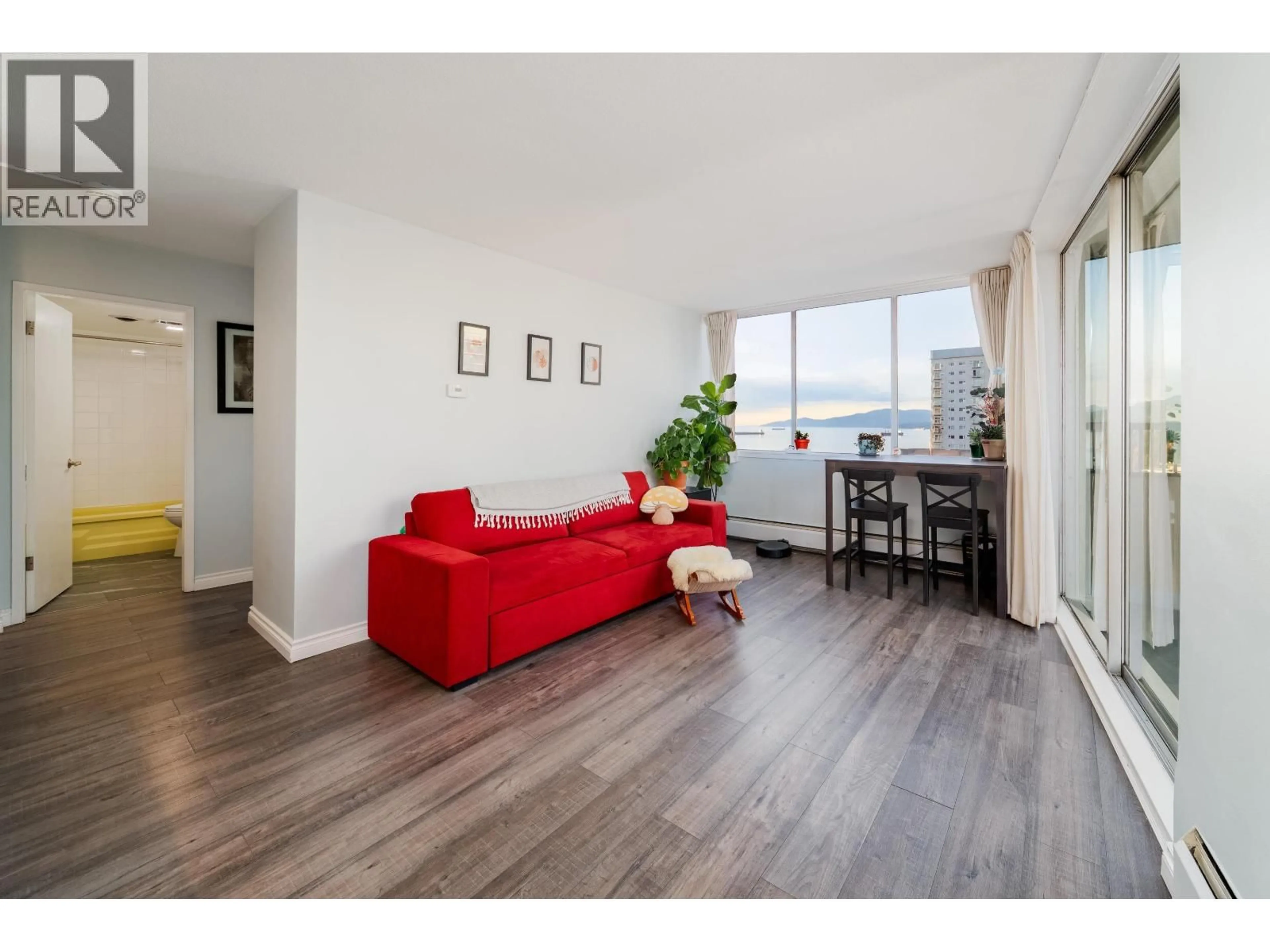 Living room with furniture, wood/laminate floor for 2004 - 1251 CARDERO STREET, Vancouver British Columbia V6G2H9