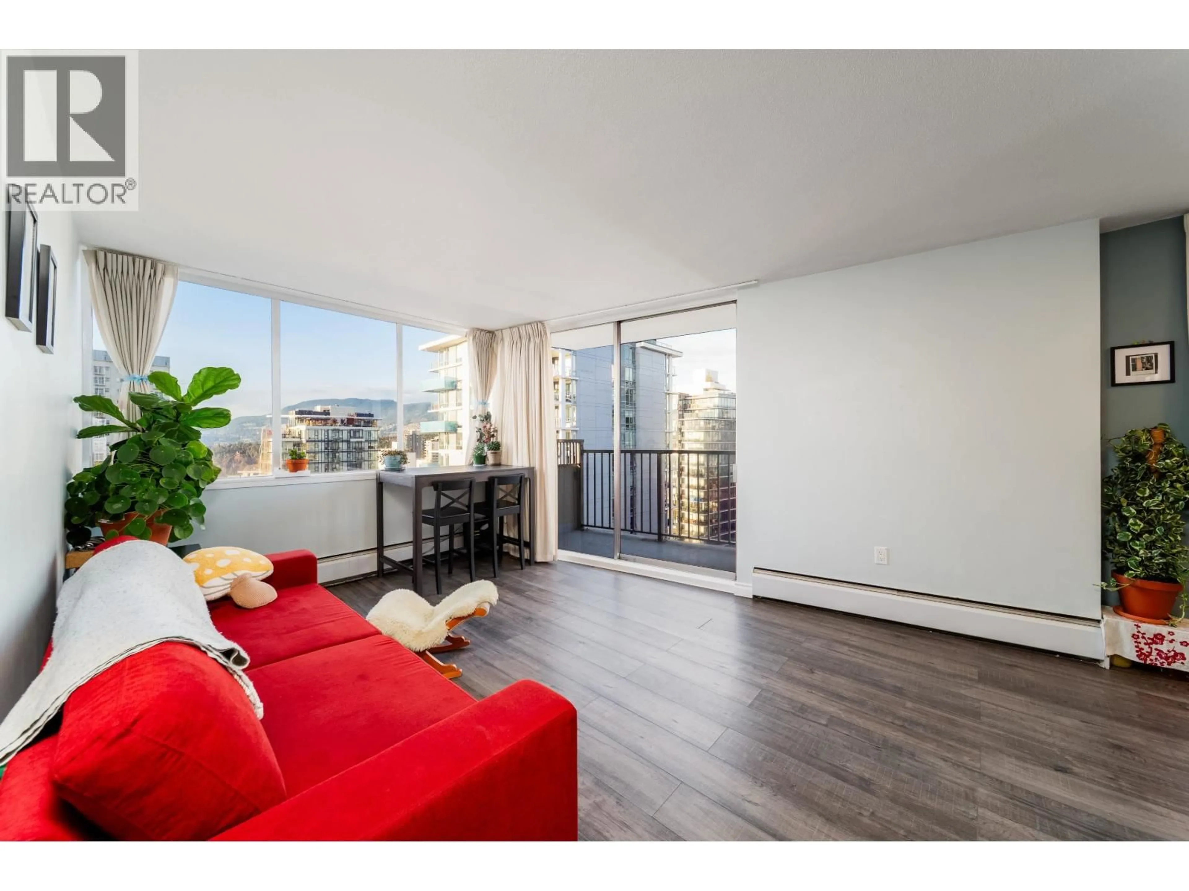 Living room with furniture, wood/laminate floor for 2004 - 1251 CARDERO STREET, Vancouver British Columbia V6G2H9