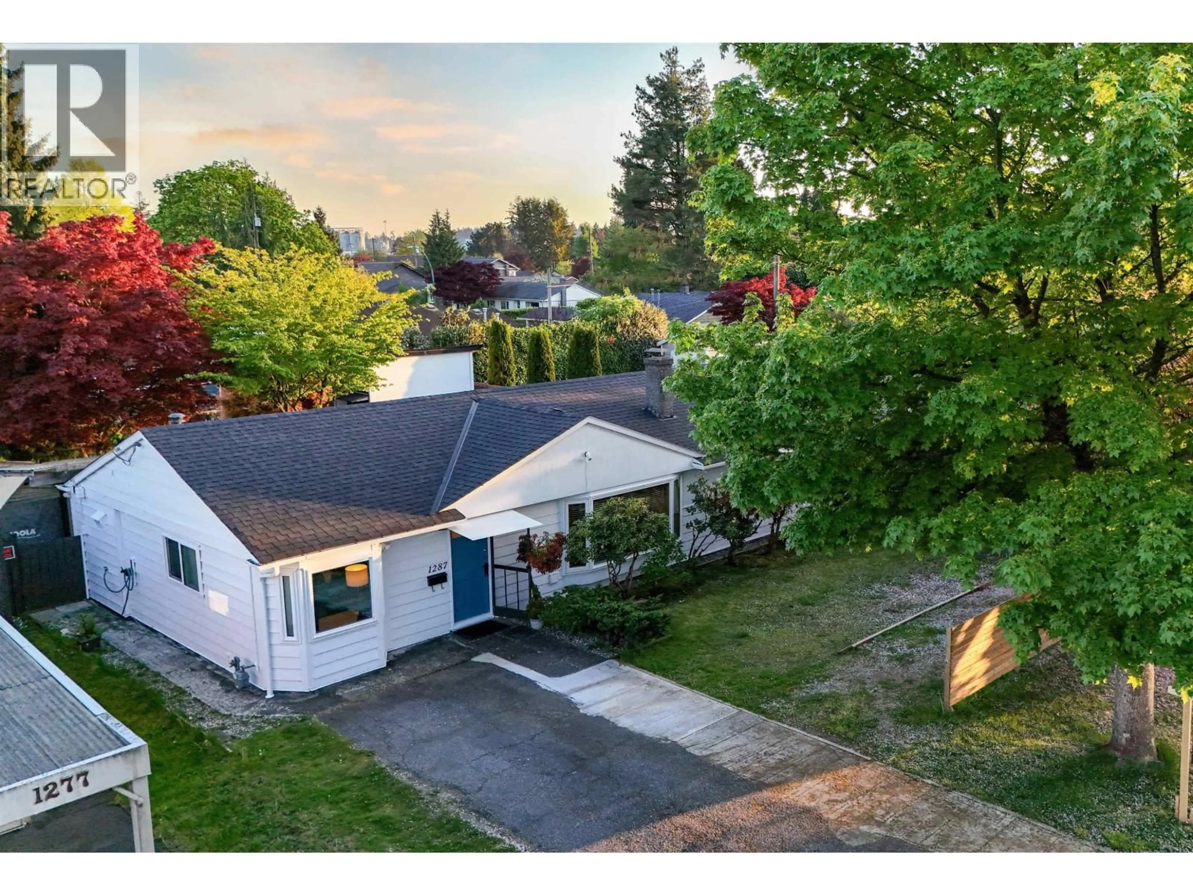 A pic from outside/outdoor area/front of a property/back of a property/a pic from drone, street for 1287 15TH STREET, North Vancouver British Columbia V7P1N1