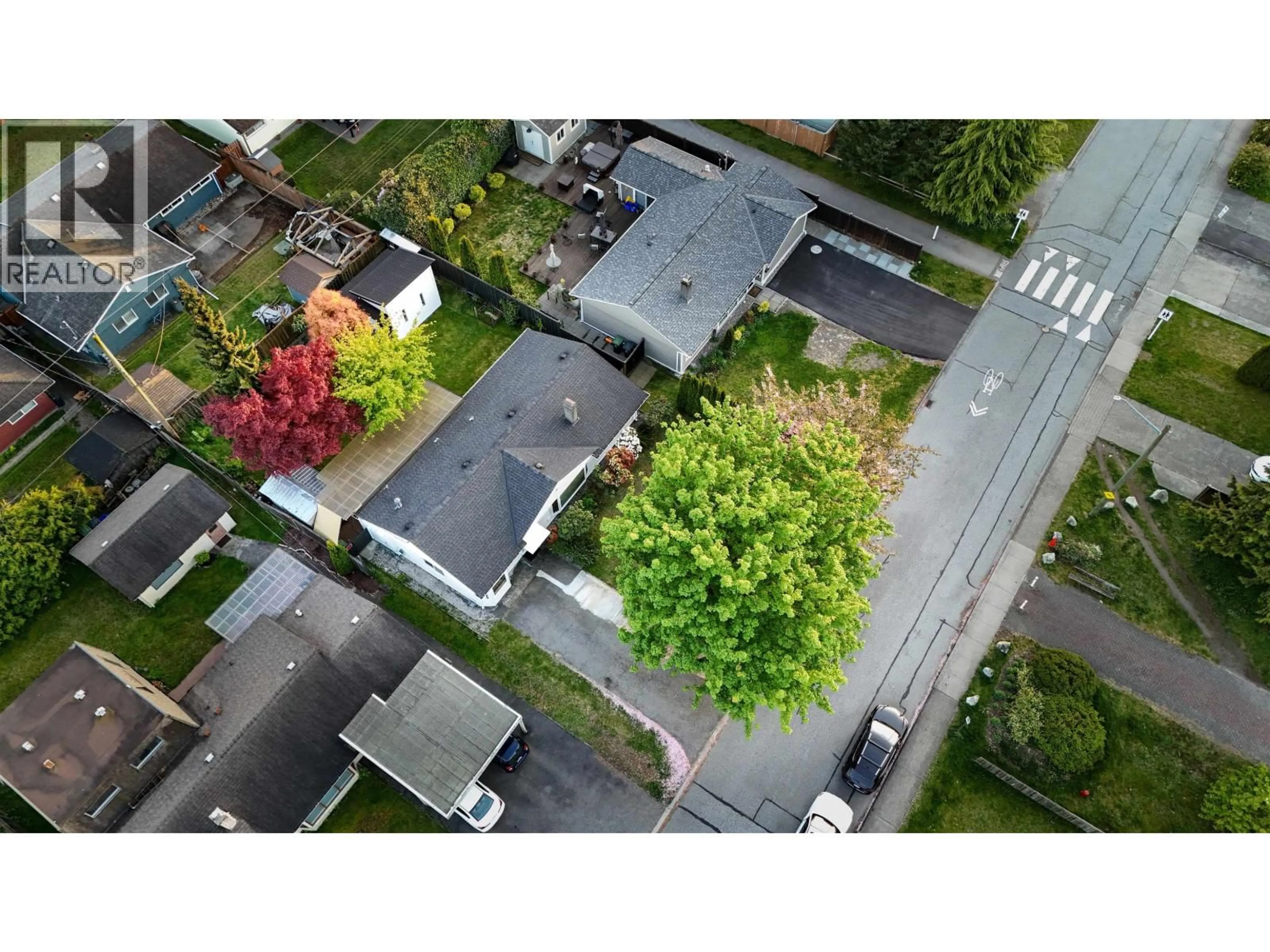 A pic from outside/outdoor area/front of a property/back of a property/a pic from drone, street for 1287 15TH STREET, North Vancouver British Columbia V7P1N1