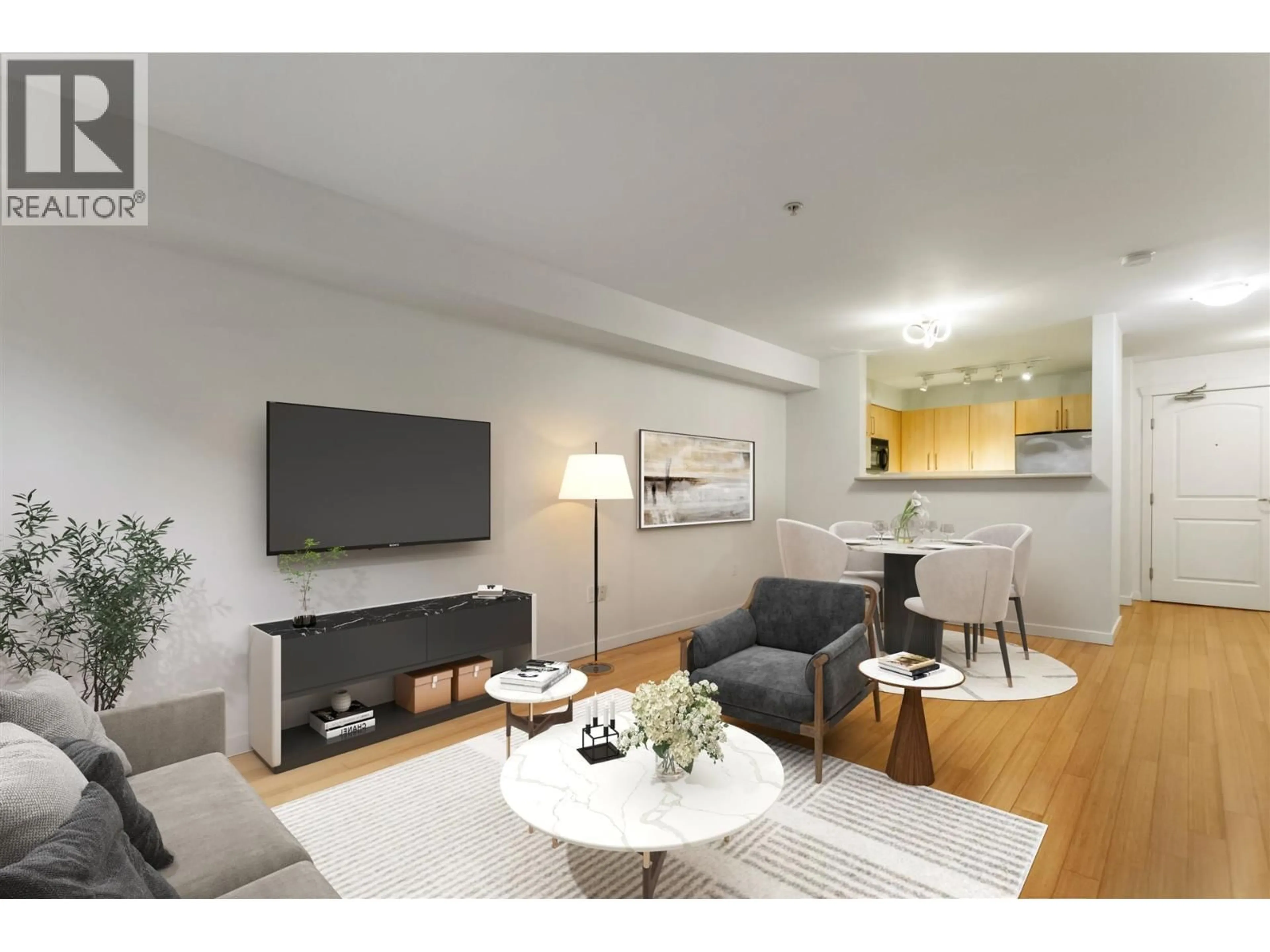 Living room with furniture, wood/laminate floor for 210 - 3575 EUCLID AVENUE, Vancouver British Columbia V5R6H5