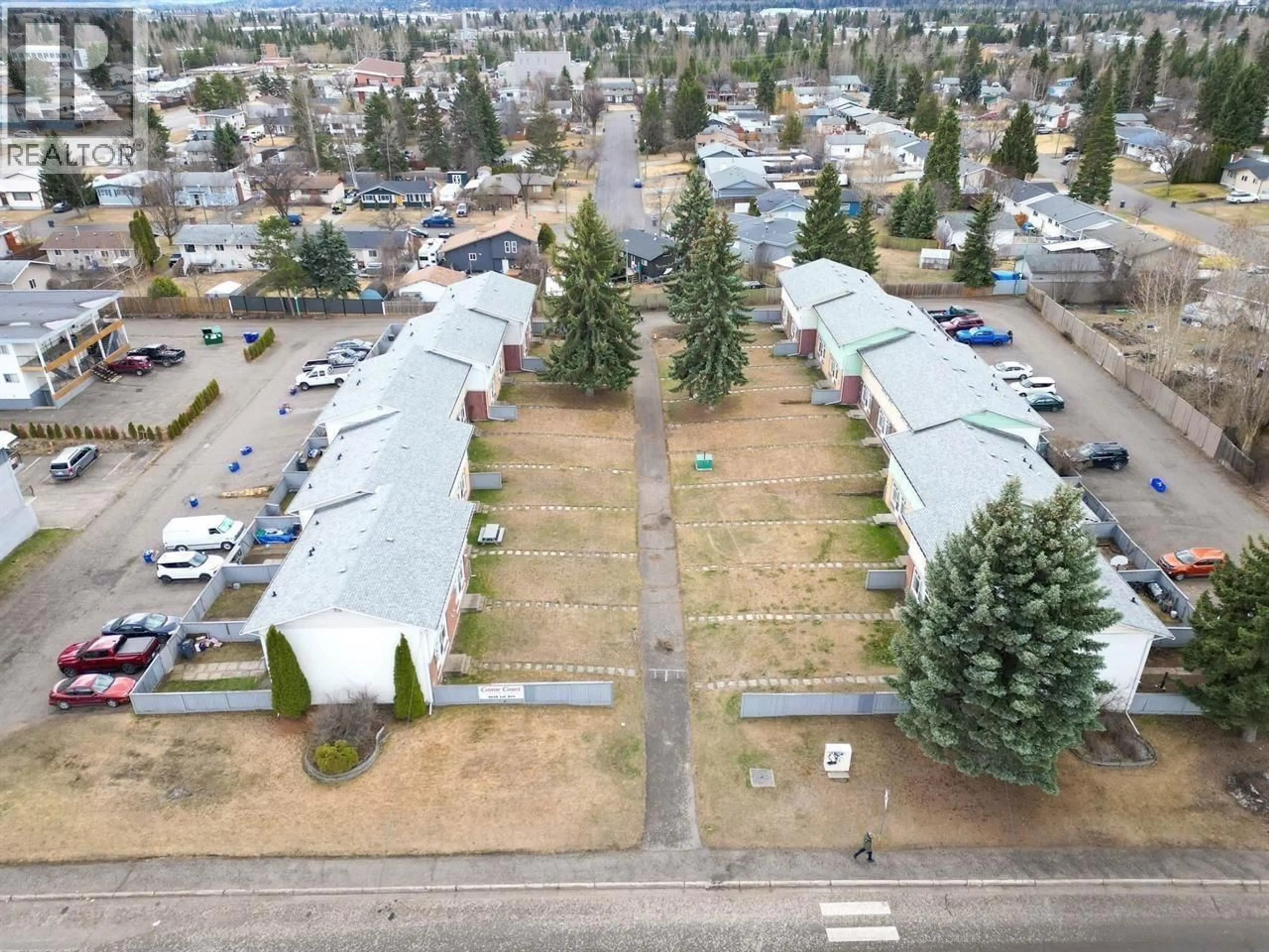 A pic from outside/outdoor area/front of a property/back of a property/a pic from drone, street for 113 - 4045 1ST AVENUE, Prince George British Columbia V2M4N2
