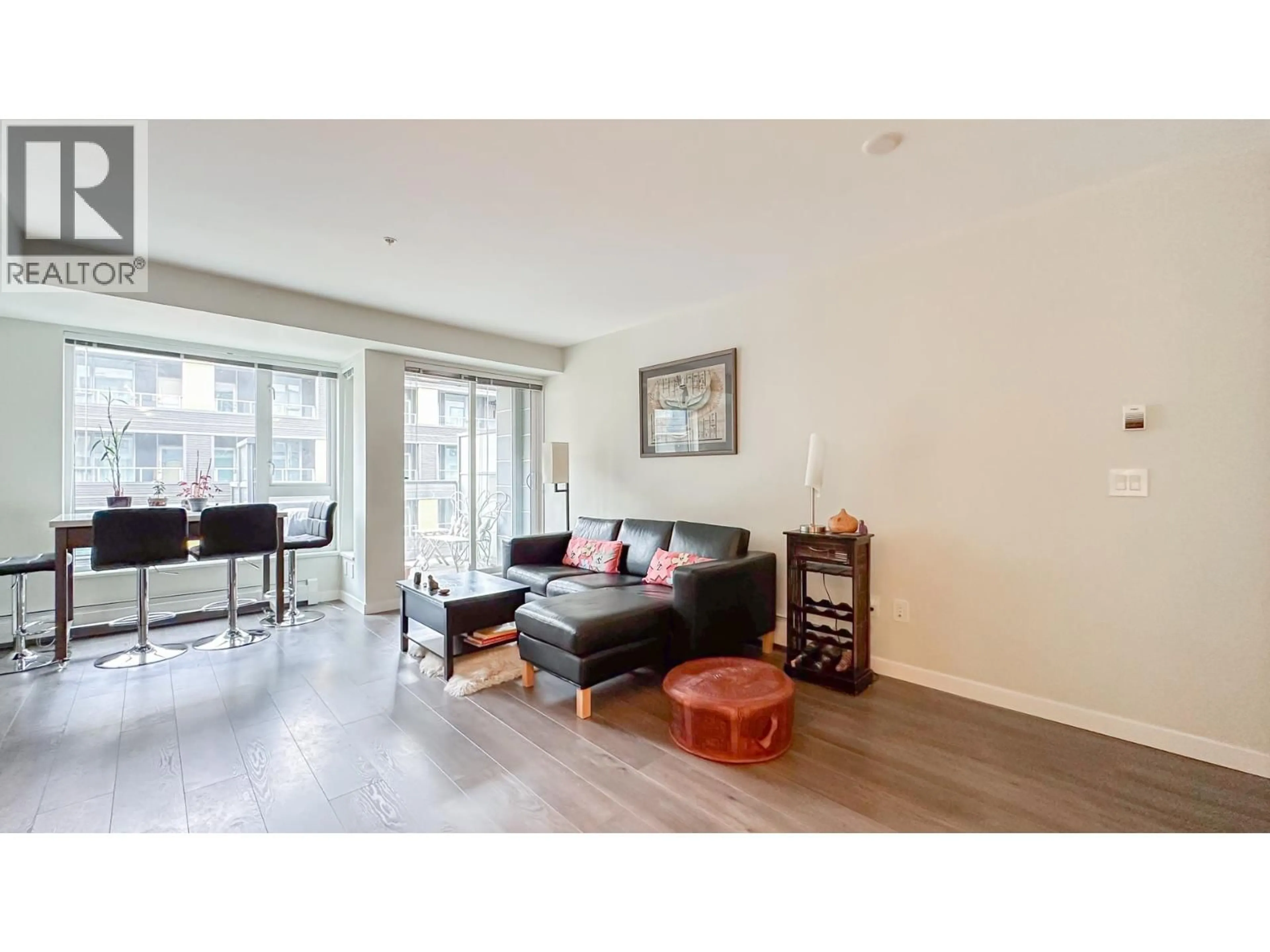 Living room with furniture, wood/laminate floor for 503 - 384 1ST AVENUE, Vancouver British Columbia V5T0G5