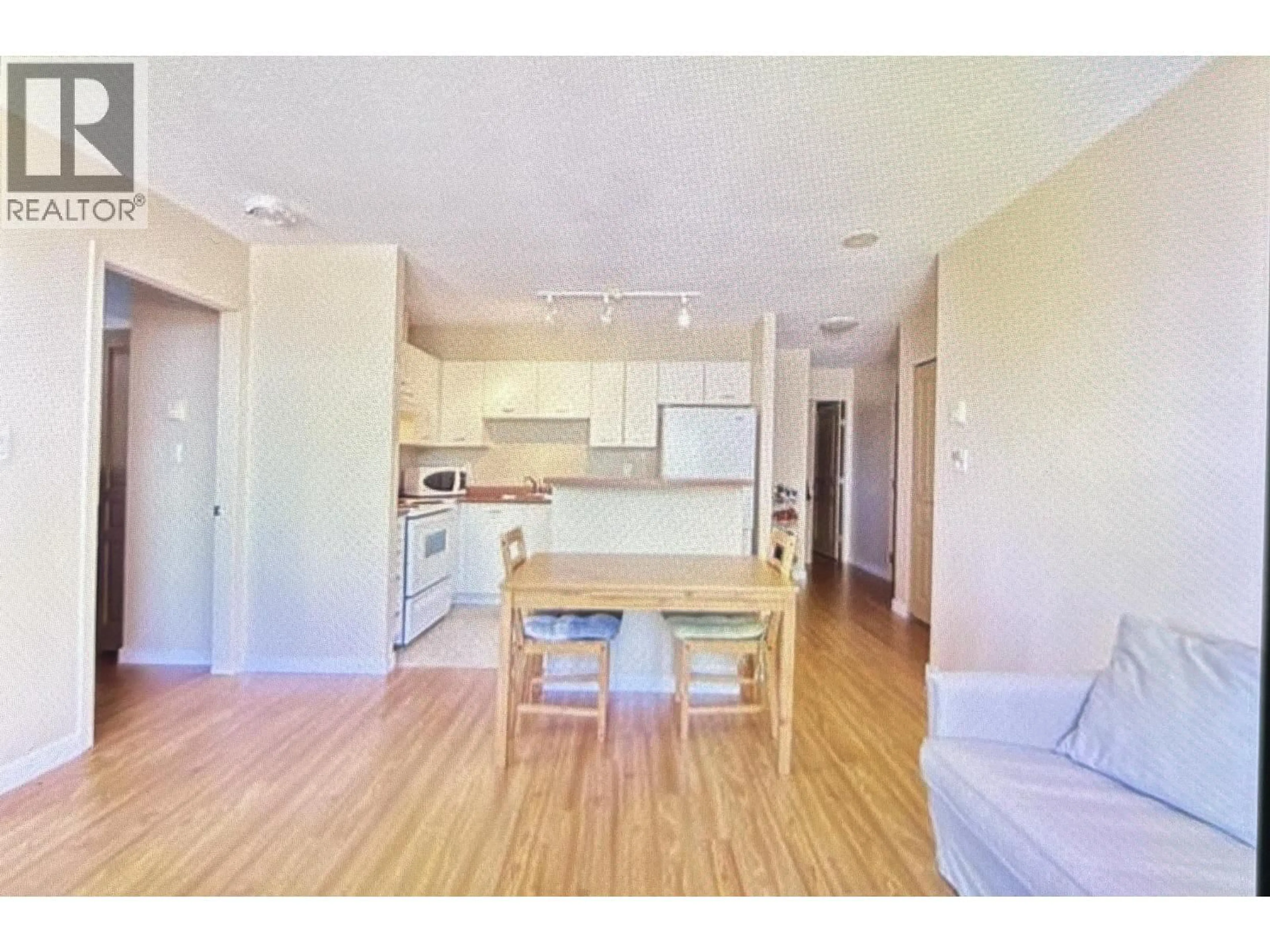 Open concept kitchen, wood/laminate floor for 506 - 3438 VANNESS AVENUE, Vancouver British Columbia V5R6E7