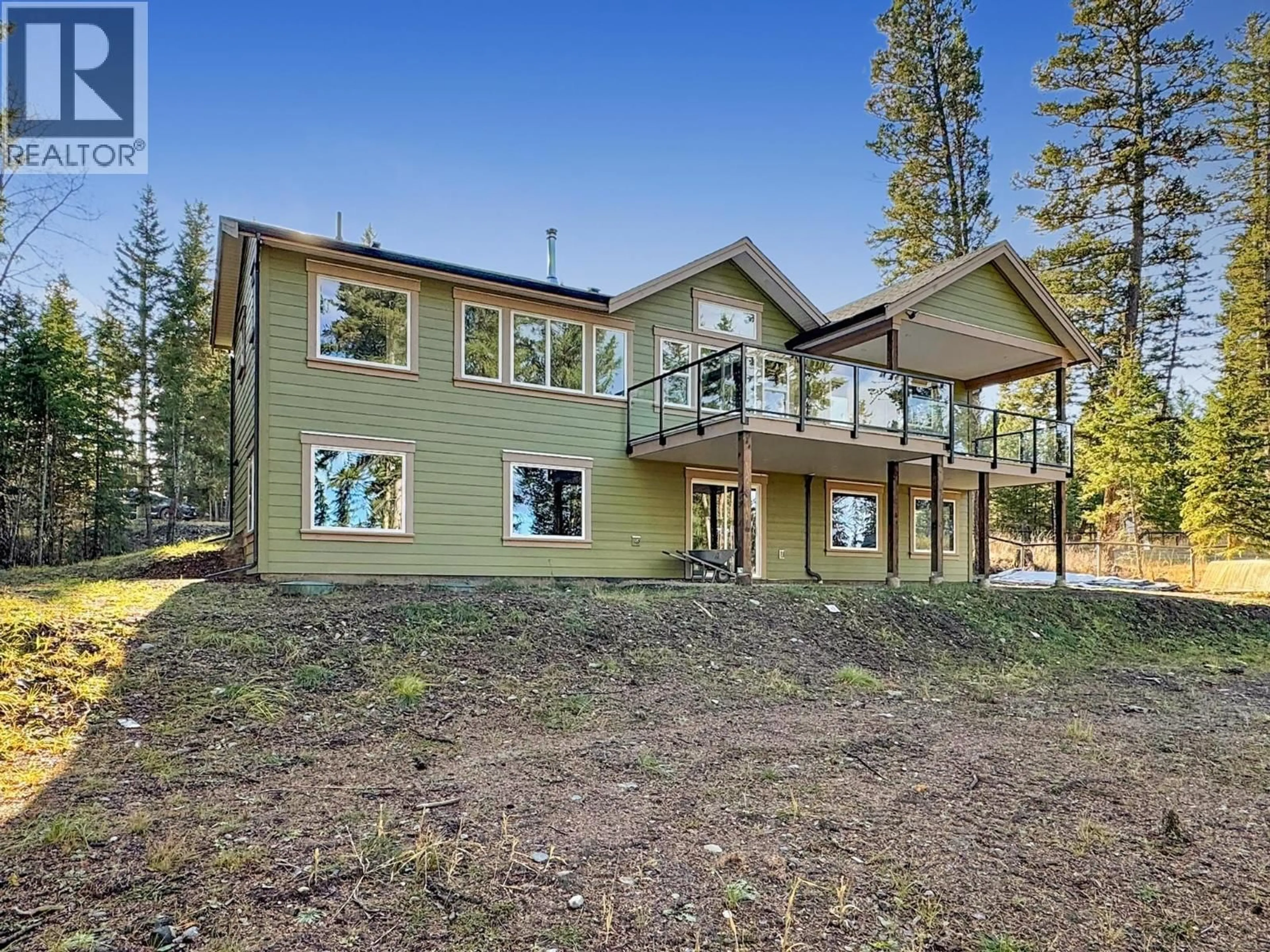 A pic from outside/outdoor area/front of a property/back of a property/a pic from drone, unknown for 5343 ANNAHAM CRESCENT, 108 Mile Ranch British Columbia V0K2Z0