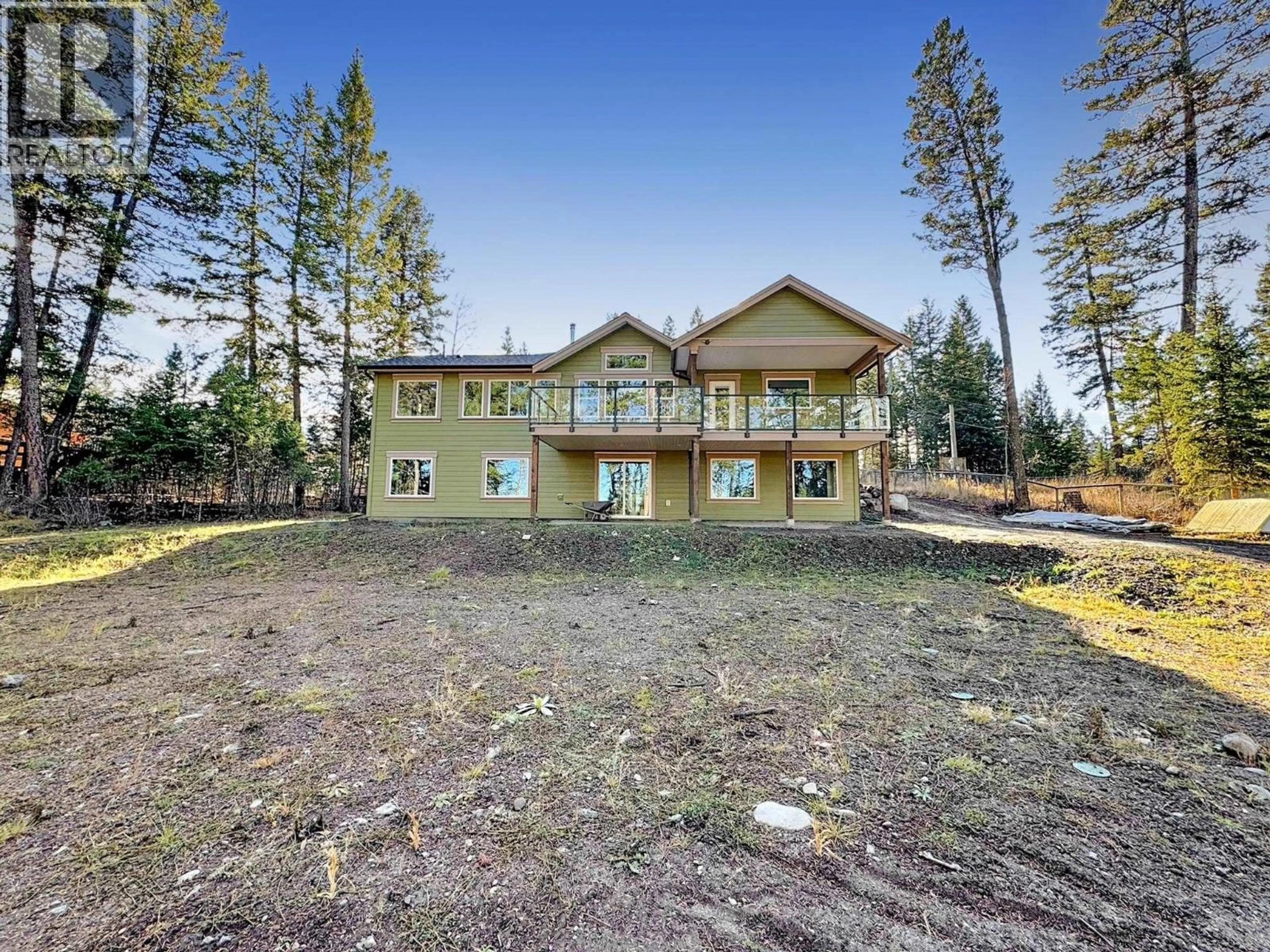 A pic from outside/outdoor area/front of a property/back of a property/a pic from drone, unknown for 5343 ANNAHAM CRESCENT, 108 Mile Ranch British Columbia V0K2Z0