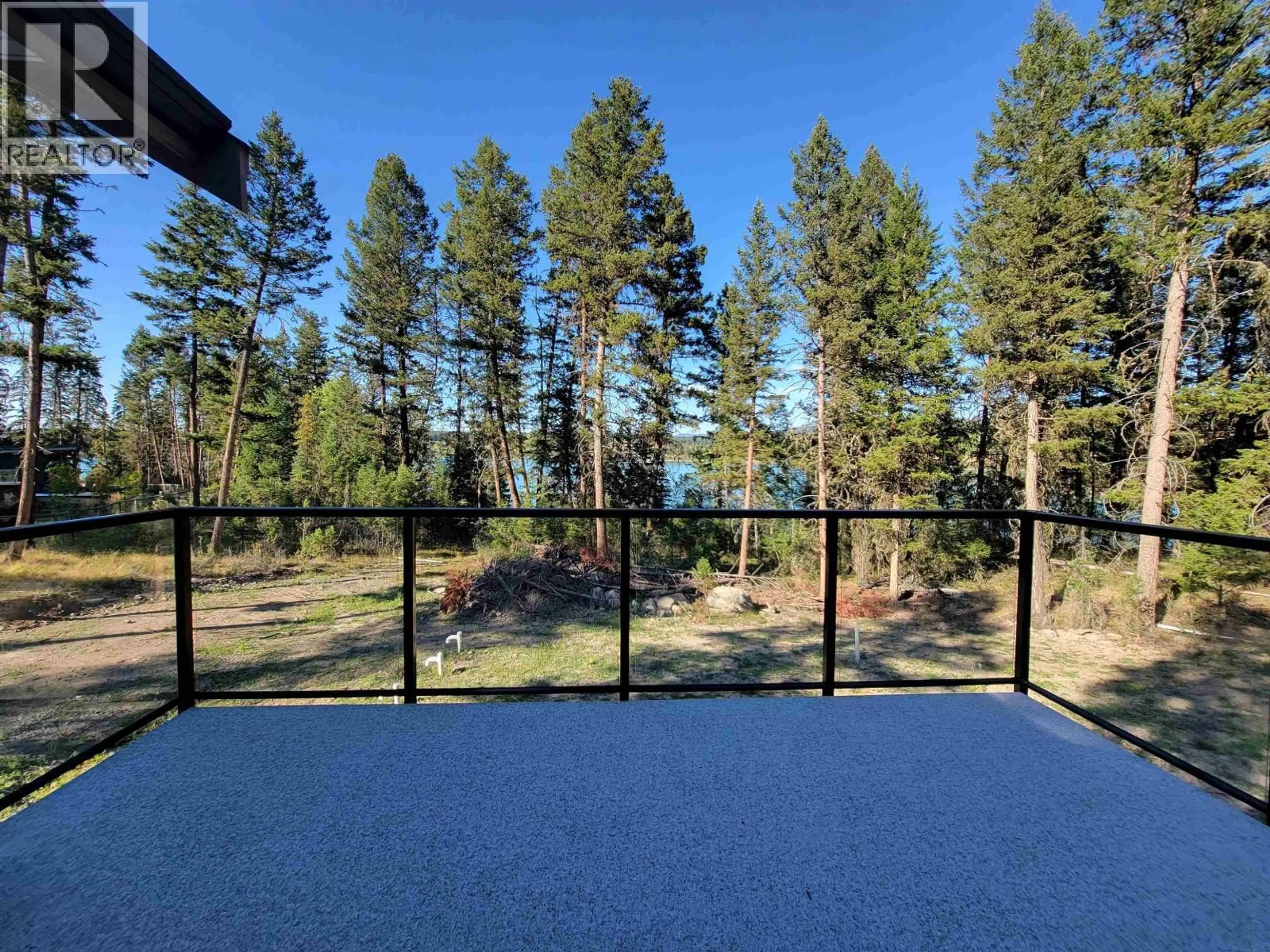 Patio, forest/trees view for 5343 ANNAHAM CRESCENT, 108 Mile Ranch British Columbia V0K2Z0