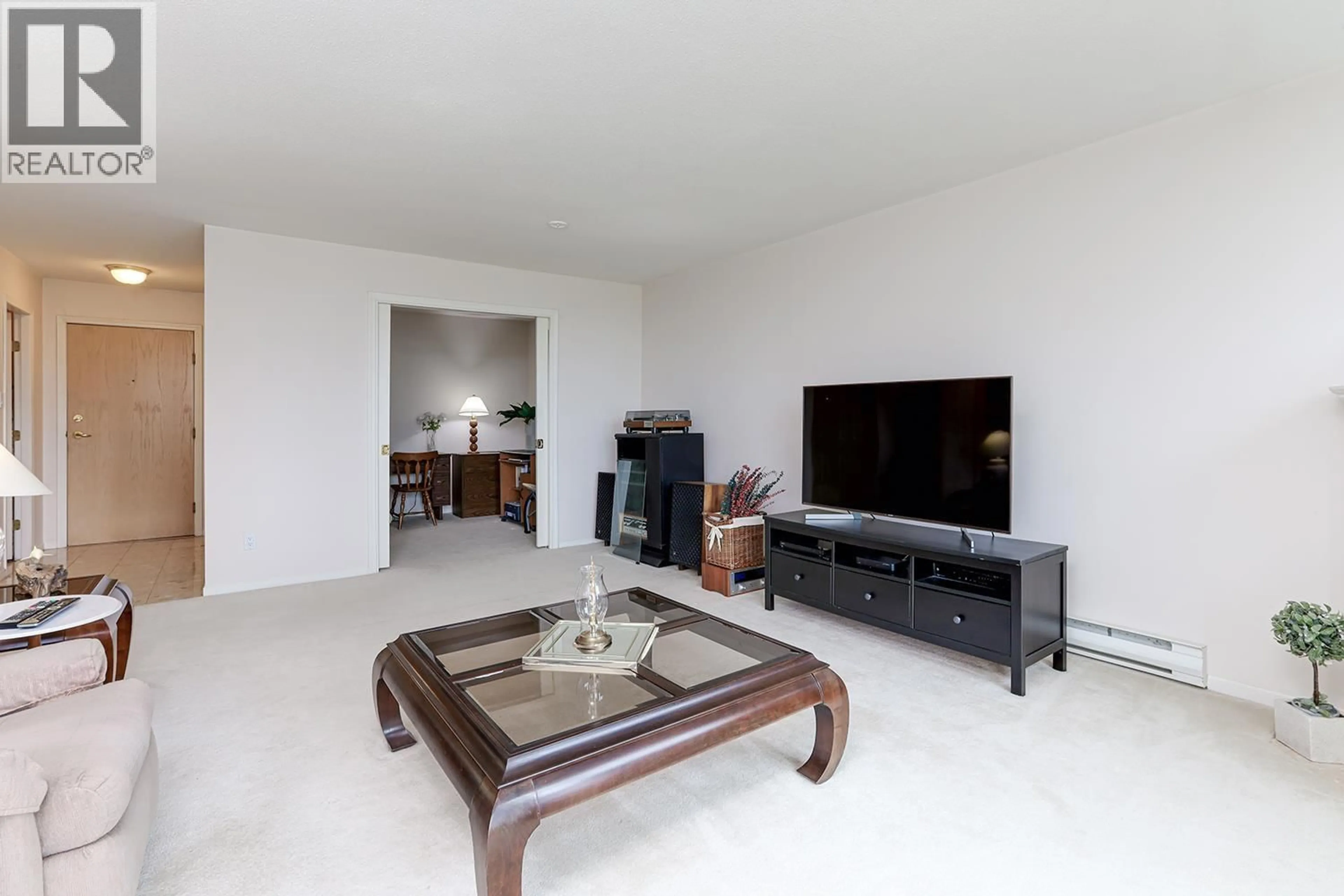 Living room with furniture, unknown for 702 - 7108 EDMONDS STREET, Burnaby British Columbia V3N4X9