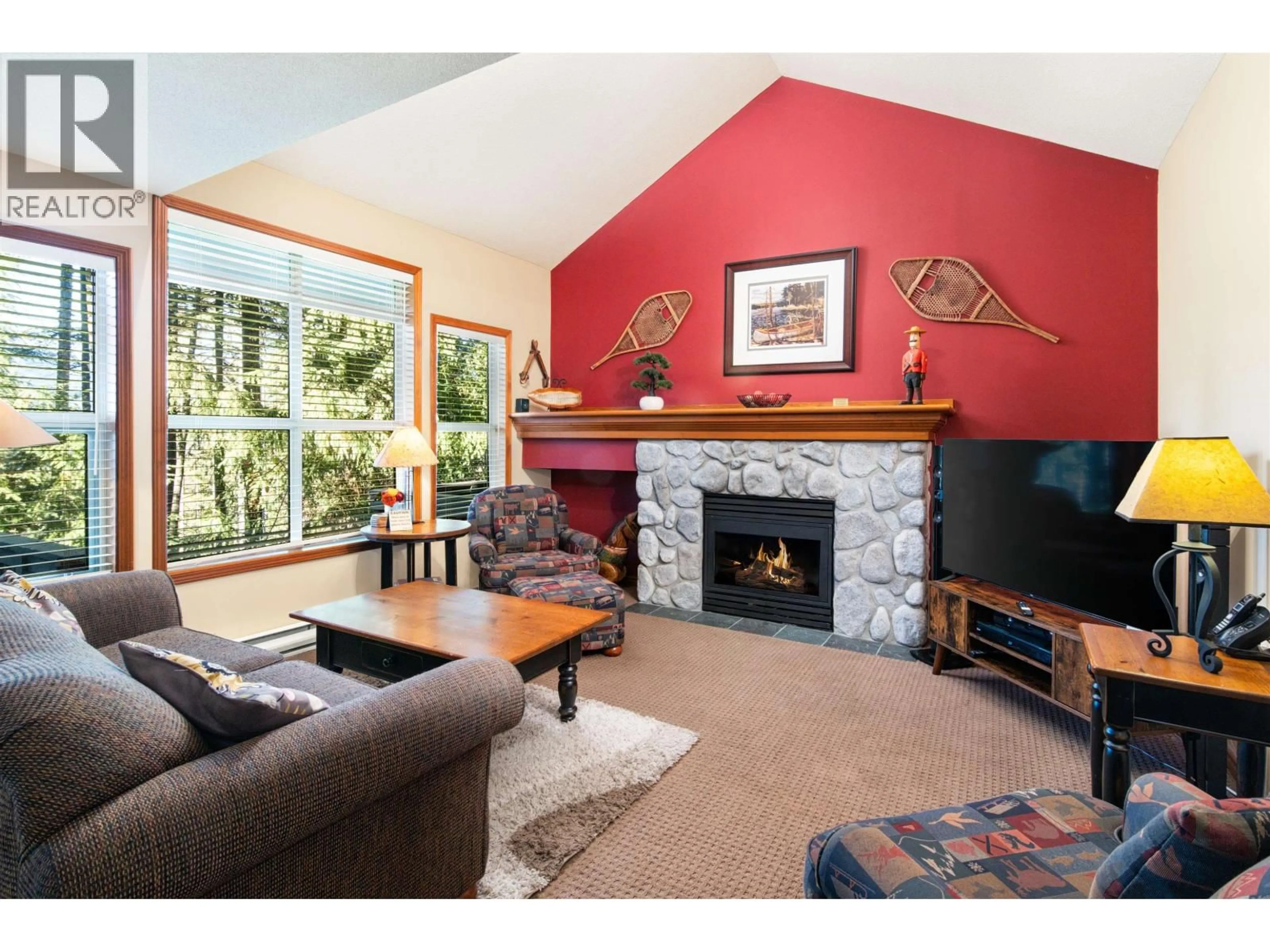 Living room with furniture, wood/laminate floor for 13 - 4890 PAINTED CLIFF ROAD, Whistler British Columbia V8E1C9
