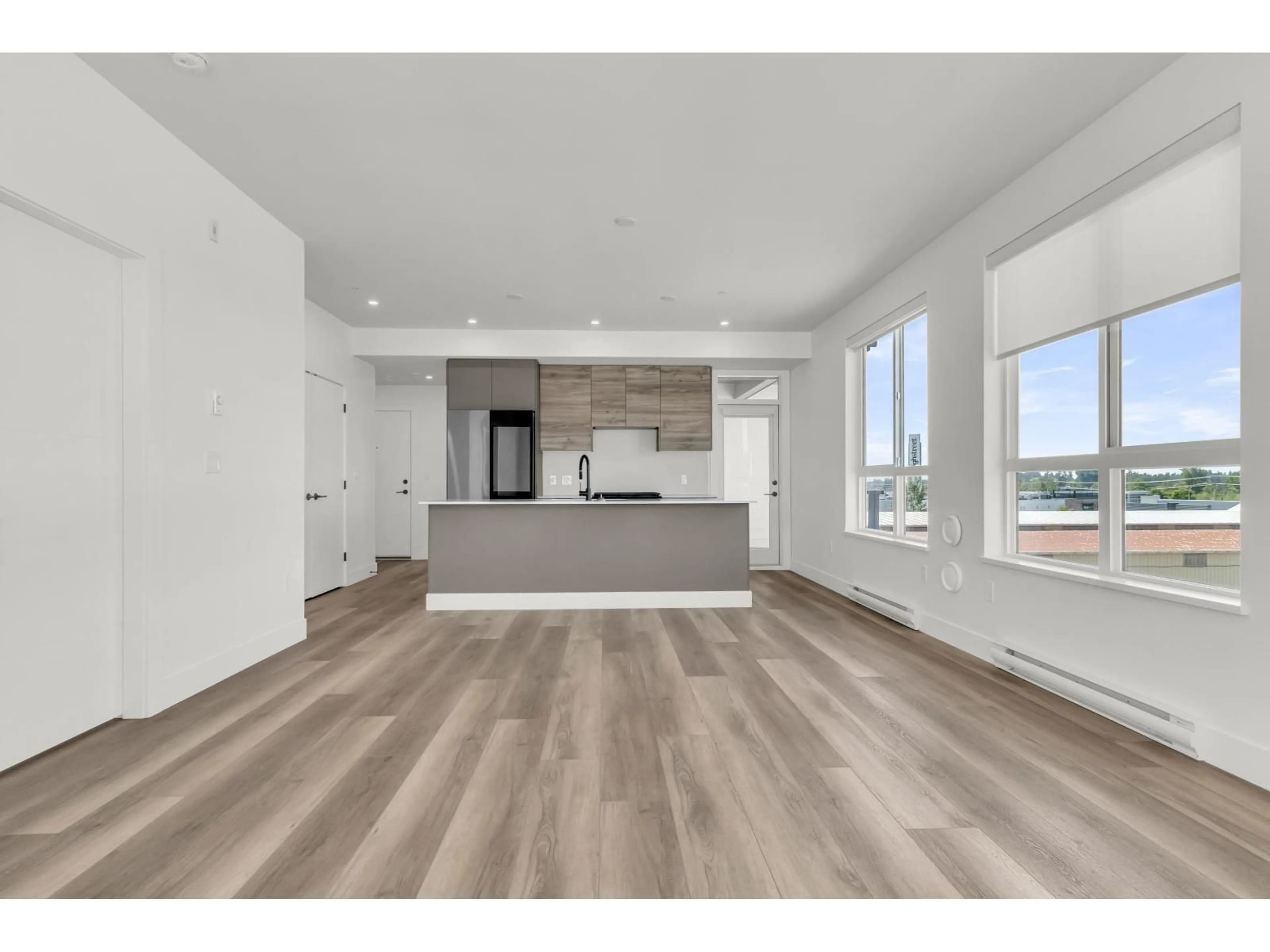 Open concept kitchen, wood/laminate floor for 511 - 30494 CARDINAL, Abbotsford British Columbia V2T0M1