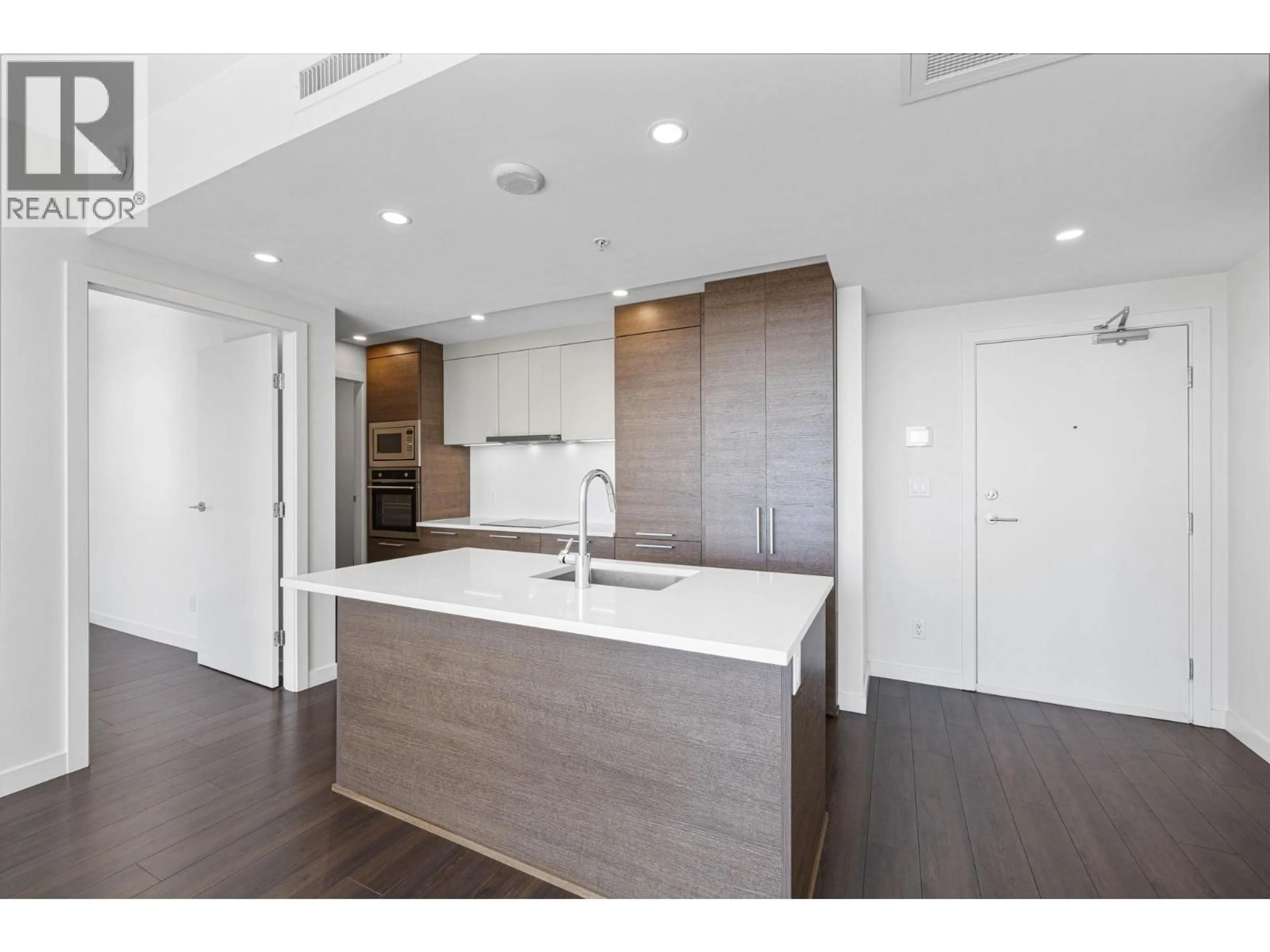 Open concept kitchen, wood/laminate floor for 2209 - 285 10TH AVENUE, Vancouver British Columbia V5Y0H6
