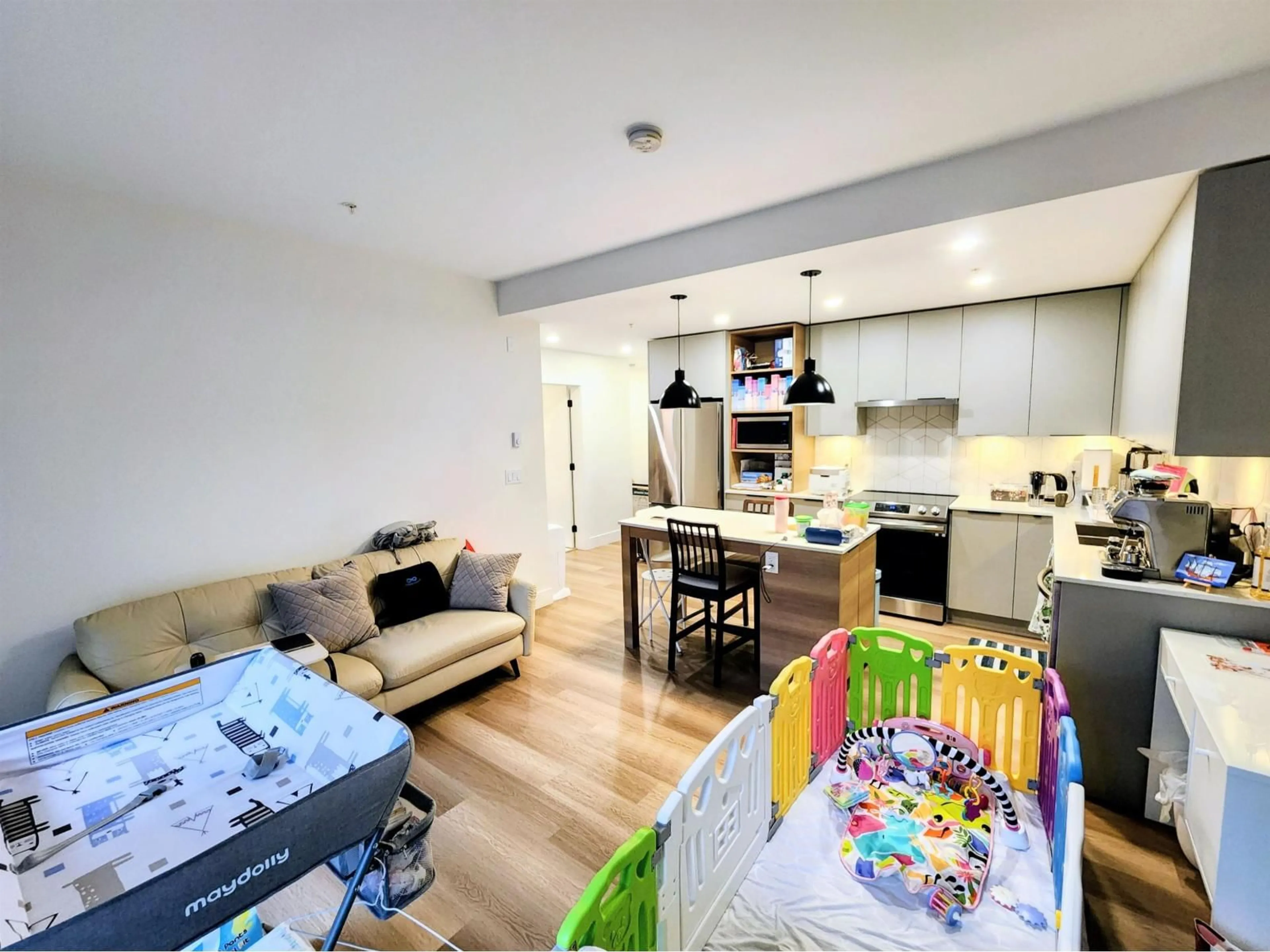 Open concept kitchen, wood/laminate floor for 201 - 10778 138, Surrey British Columbia V3T0S5