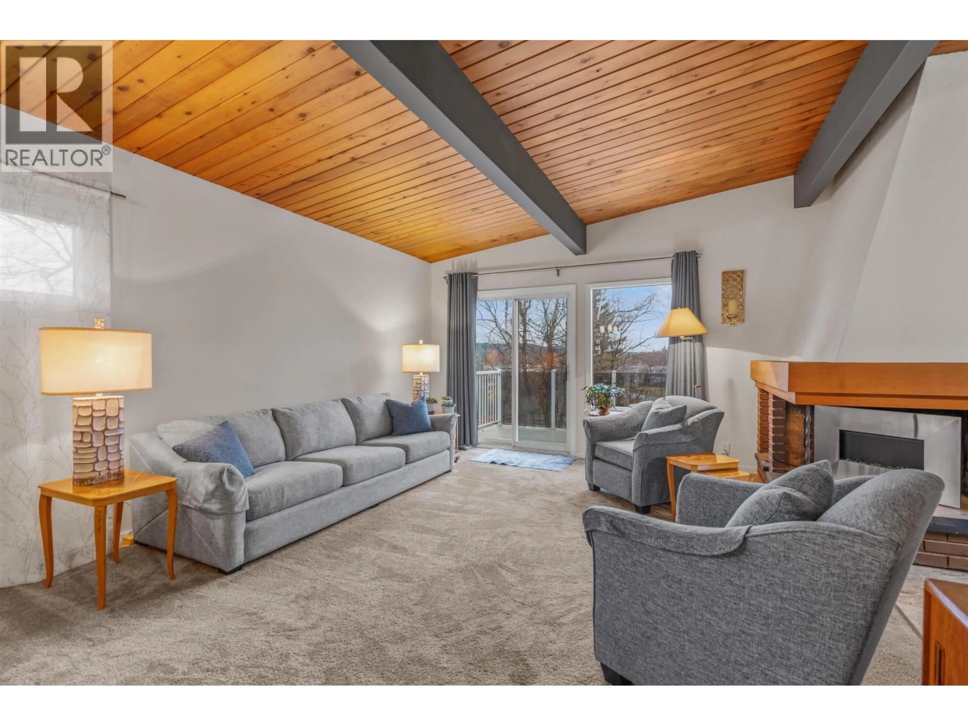 Living room with furniture, wood/laminate floor for 1768 EDMONTON STREET, Prince George British Columbia V2M1X4