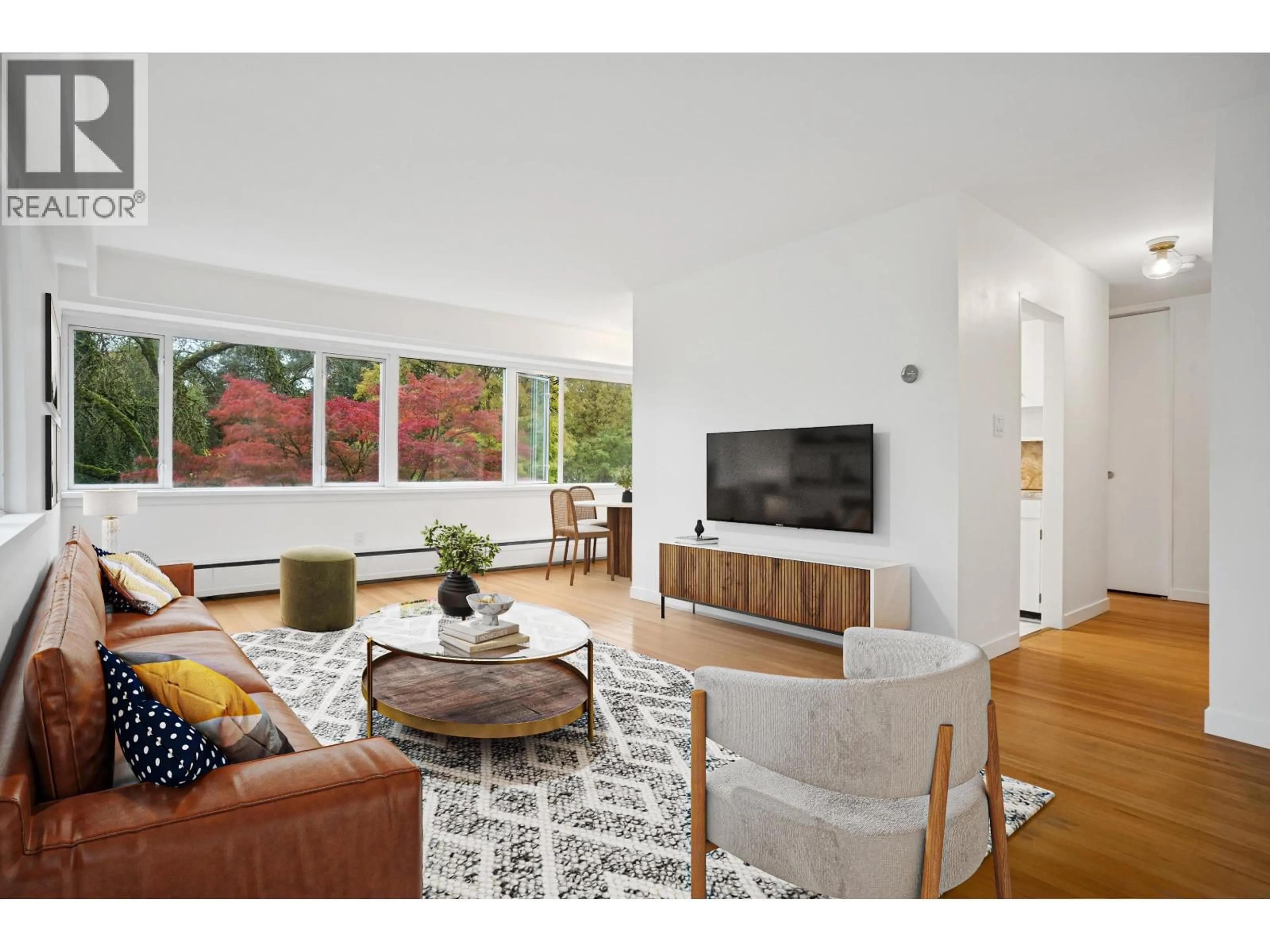 Living room with furniture, unknown for 103 - 6026 TISDALL STREET, Vancouver British Columbia V5Z3N2