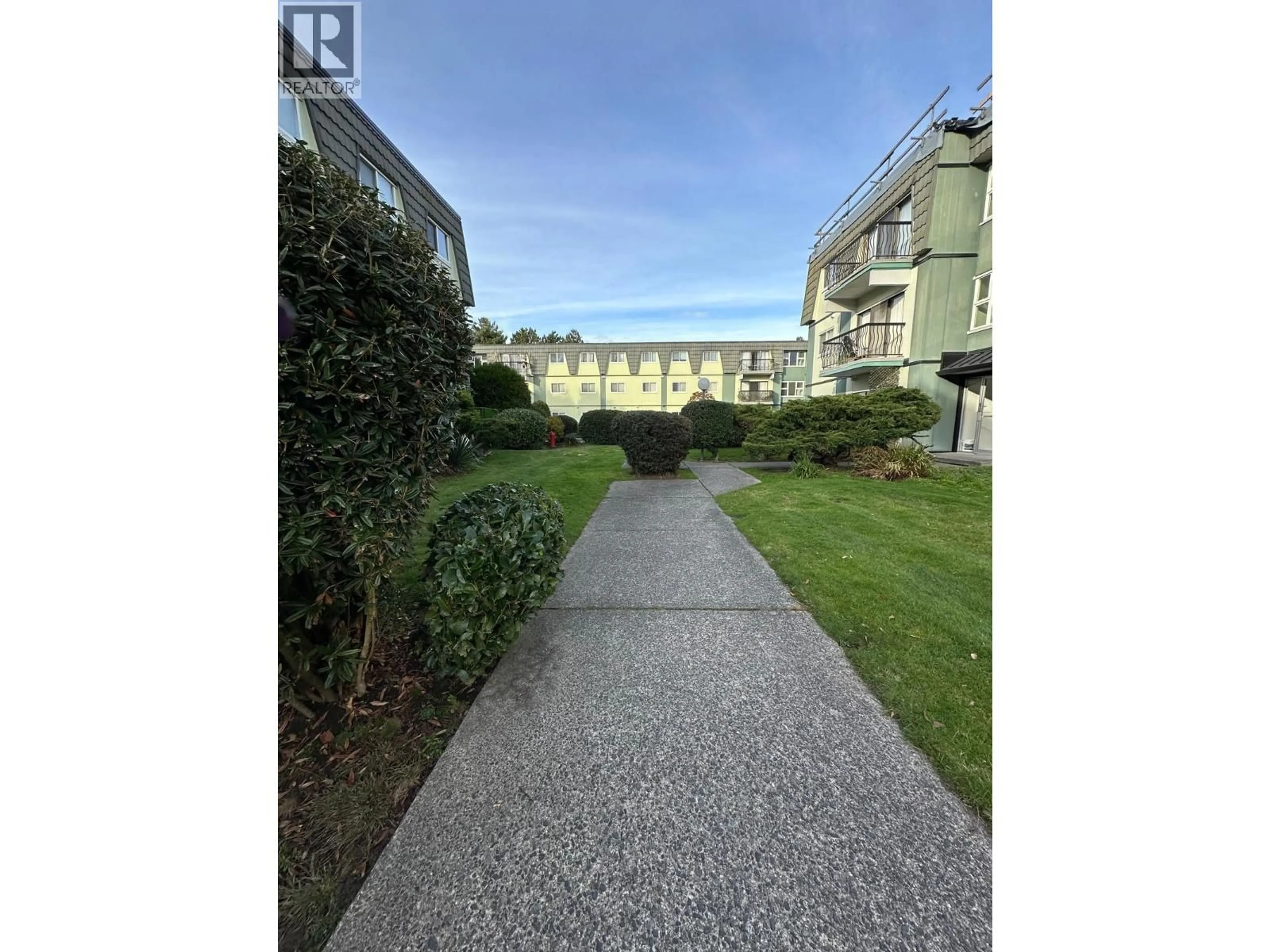 A pic from outside/outdoor area/front of a property/back of a property/a pic from drone, street for 311 - 8011 RYAN ROAD, Richmond British Columbia V7A2E4