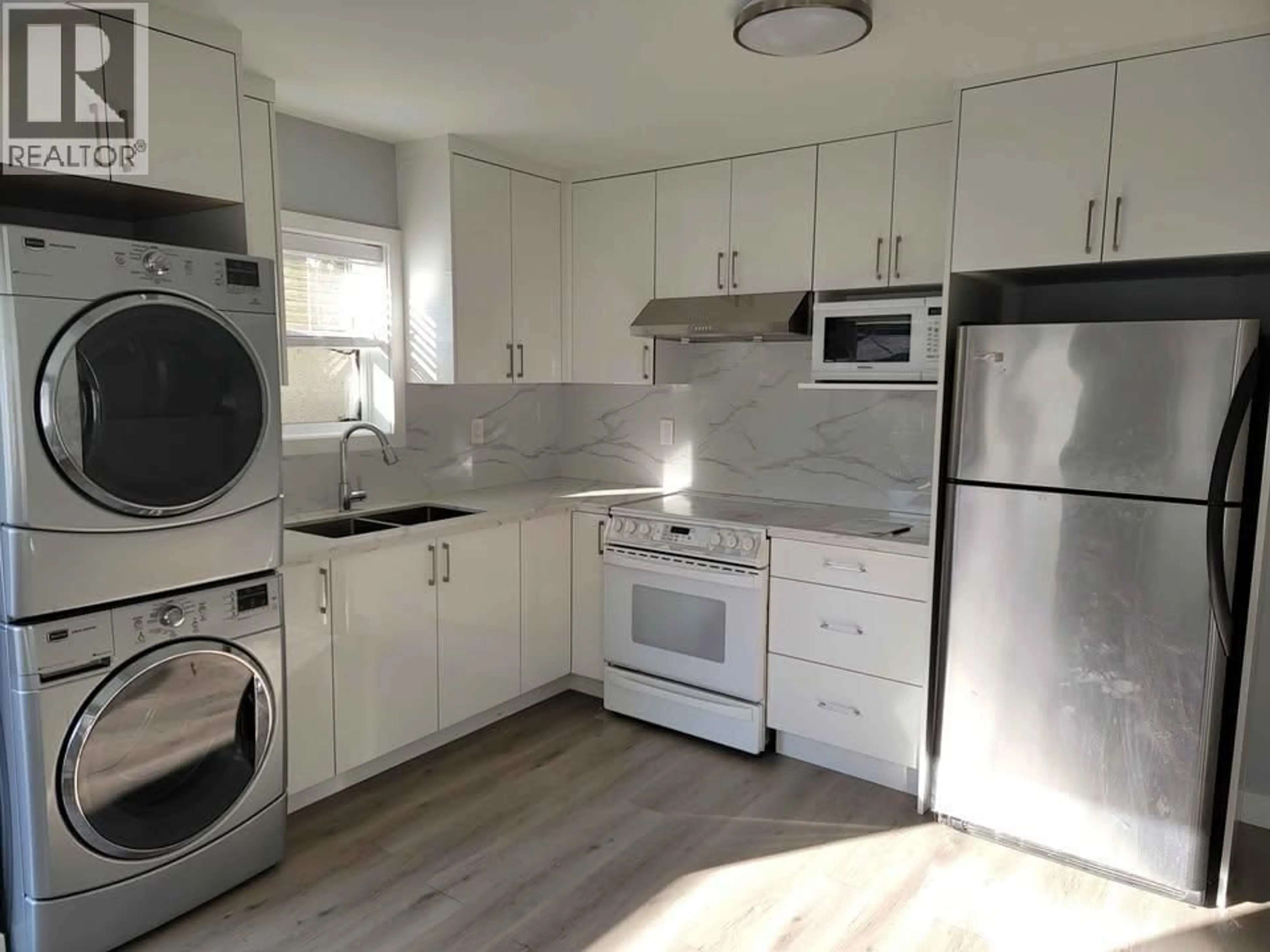 Standard kitchen, wood/laminate floor for 2456 19TH AVENUE, Vancouver British Columbia V5M2R9