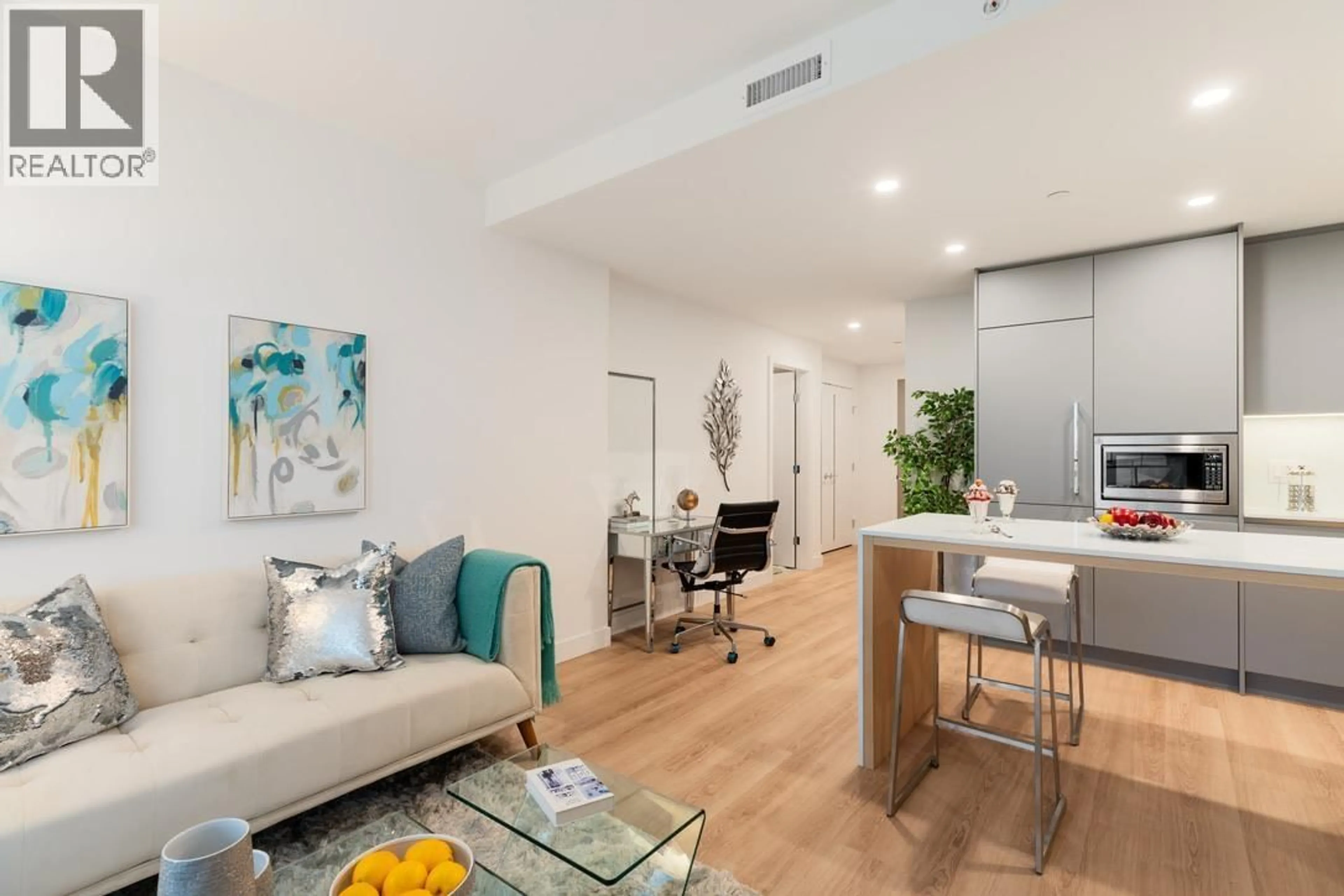 Living room with furniture, wood/laminate floor for 901 - 7977 LANSDOWNE ROAD, Richmond British Columbia V6X0X7