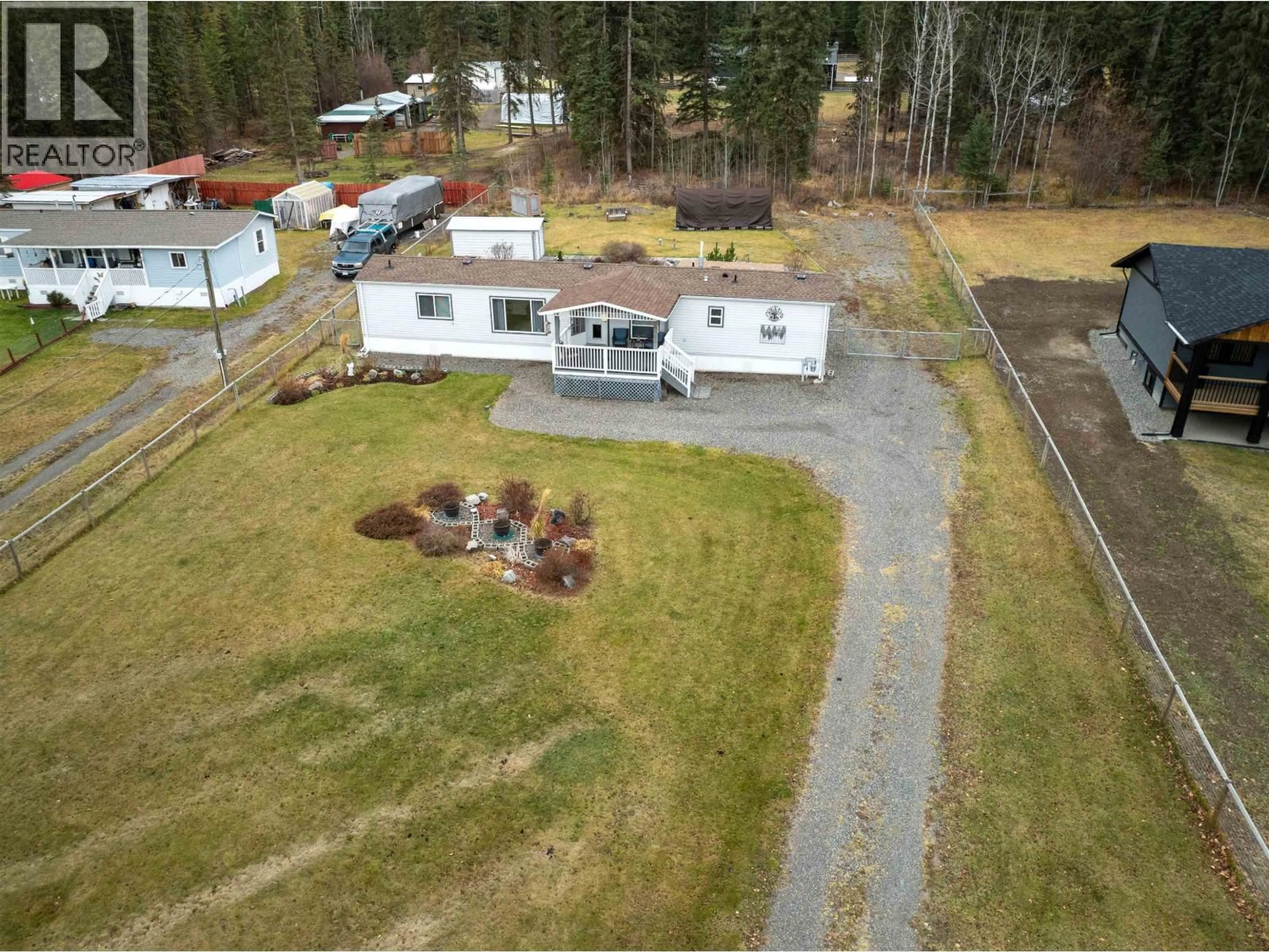 A pic from outside/outdoor area/front of a property/back of a property/a pic from drone, unknown for 6064 NORMAN ROAD, 100 Mile House British Columbia V0K2E3