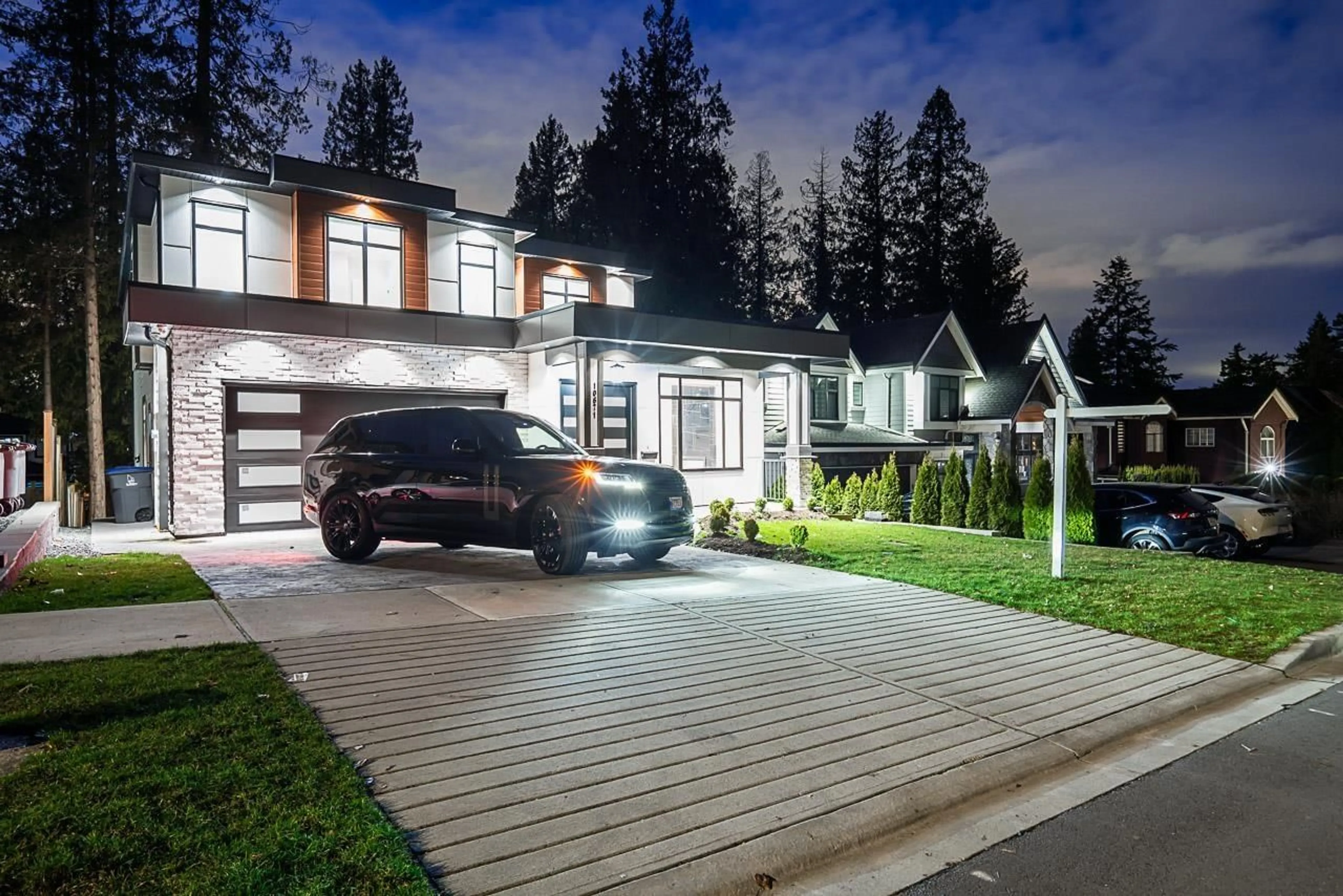 Home with vinyl exterior material, street for 10671 127A, Surrey British Columbia V3V5L7