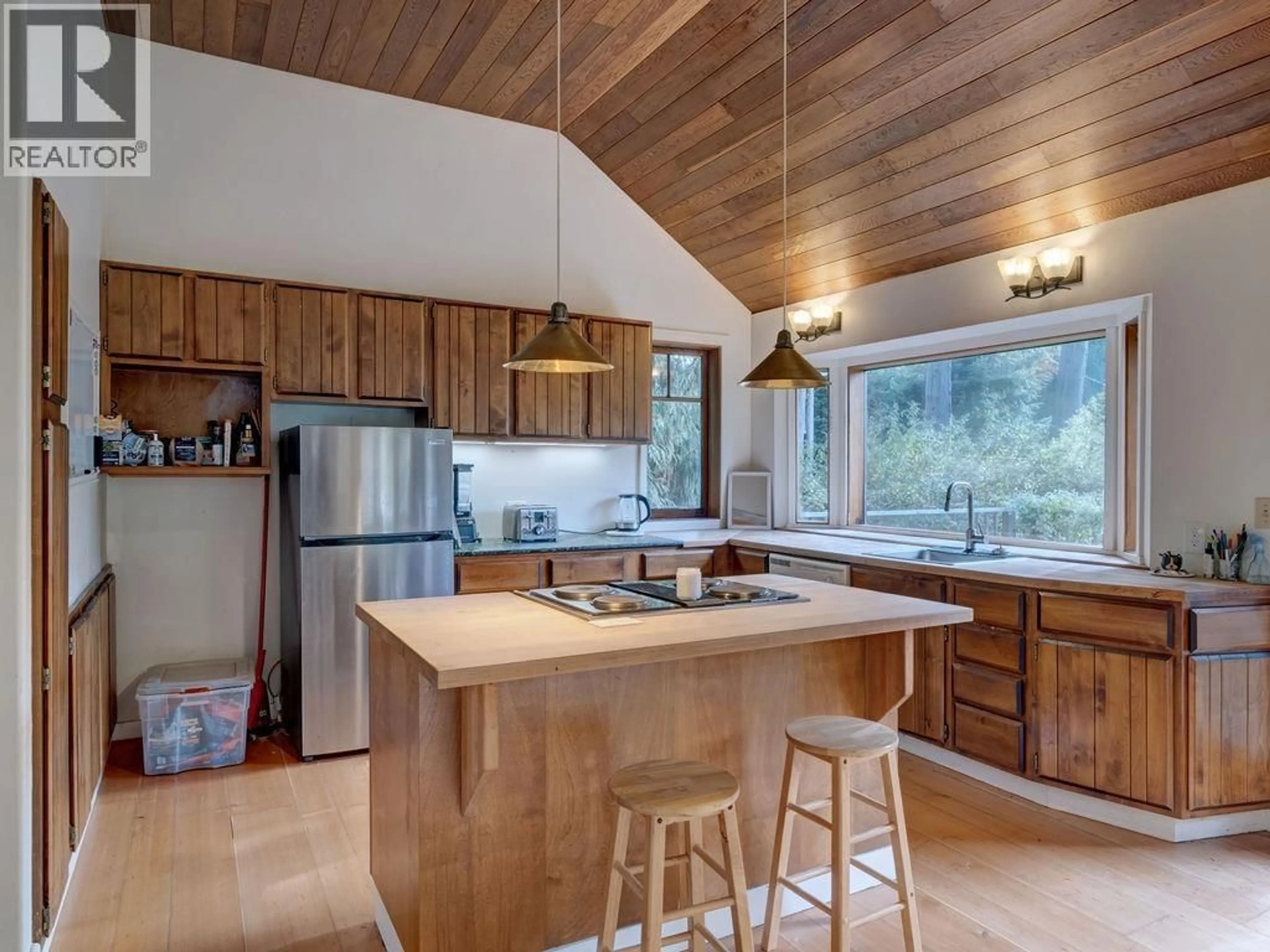 Open concept kitchen, wood/laminate floor for 1321 MARLENE ROAD, Roberts Creek British Columbia V0N2W2