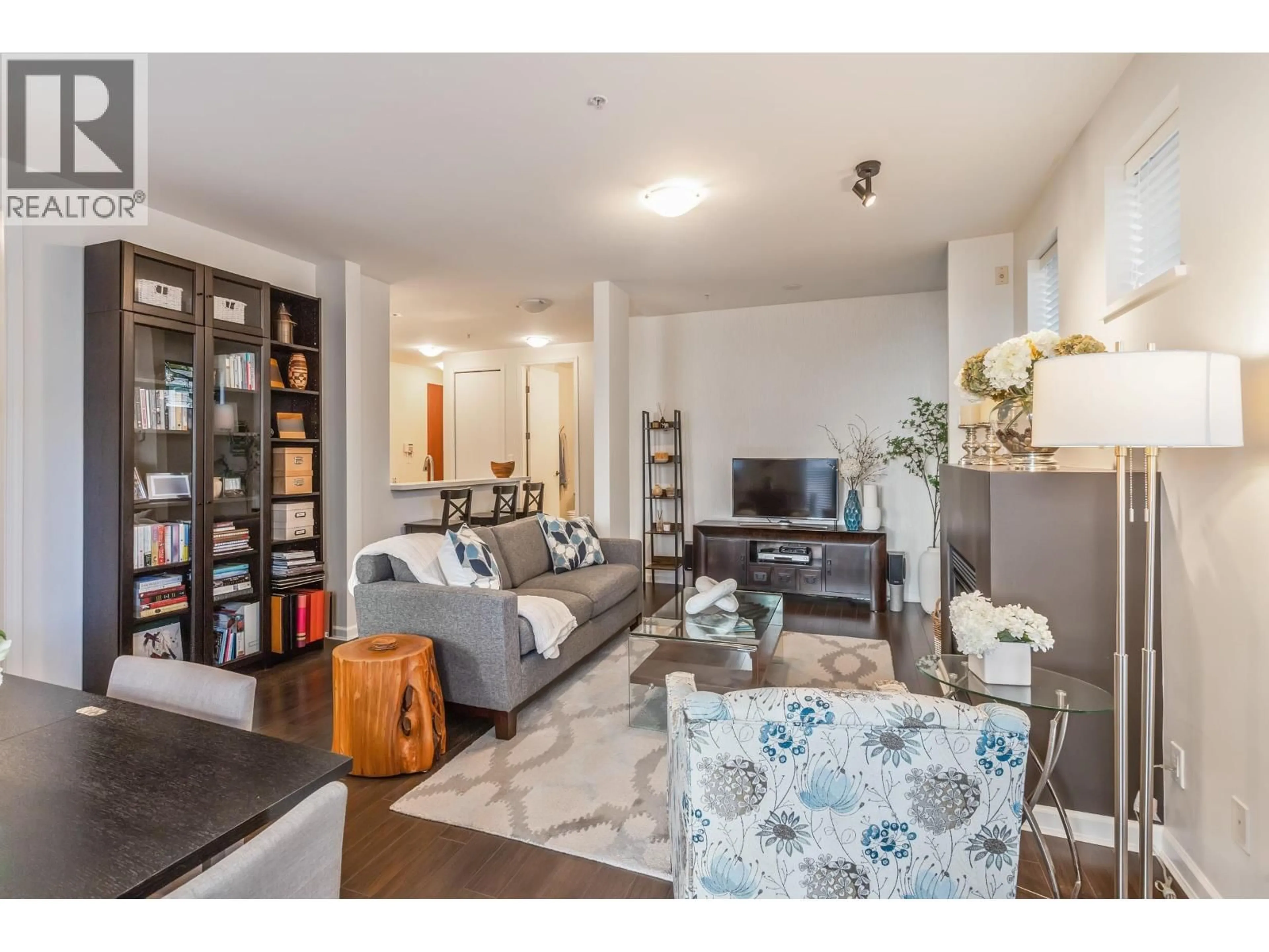 Living room with furniture, wood/laminate floor for 104 - 2065 12TH AVENUE, Vancouver British Columbia V6J5L9