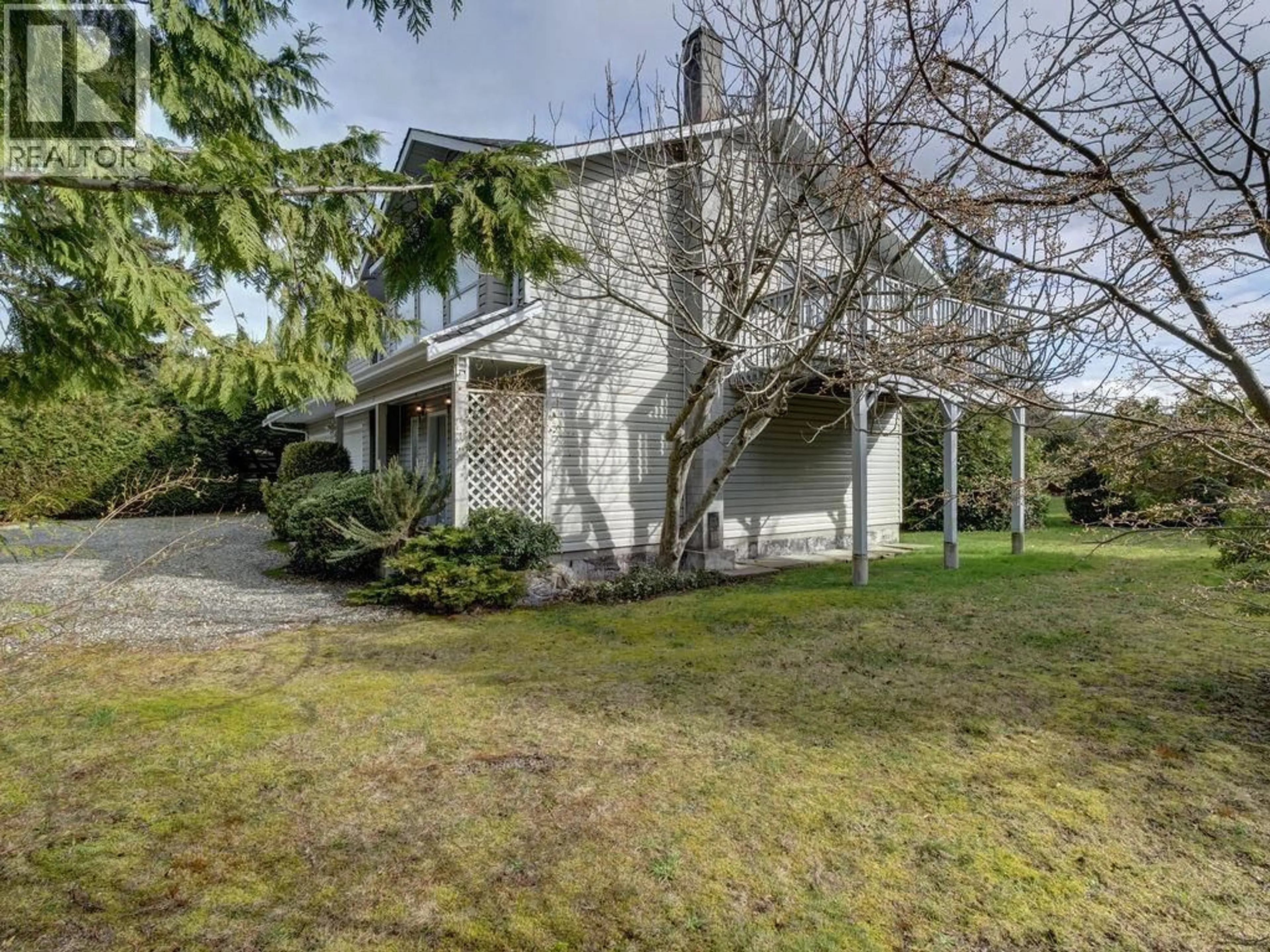 A pic from outside/outdoor area/front of a property/back of a property/a pic from drone, street for 5642 NICKERSON ROAD, Sechelt British Columbia V7Z0M6