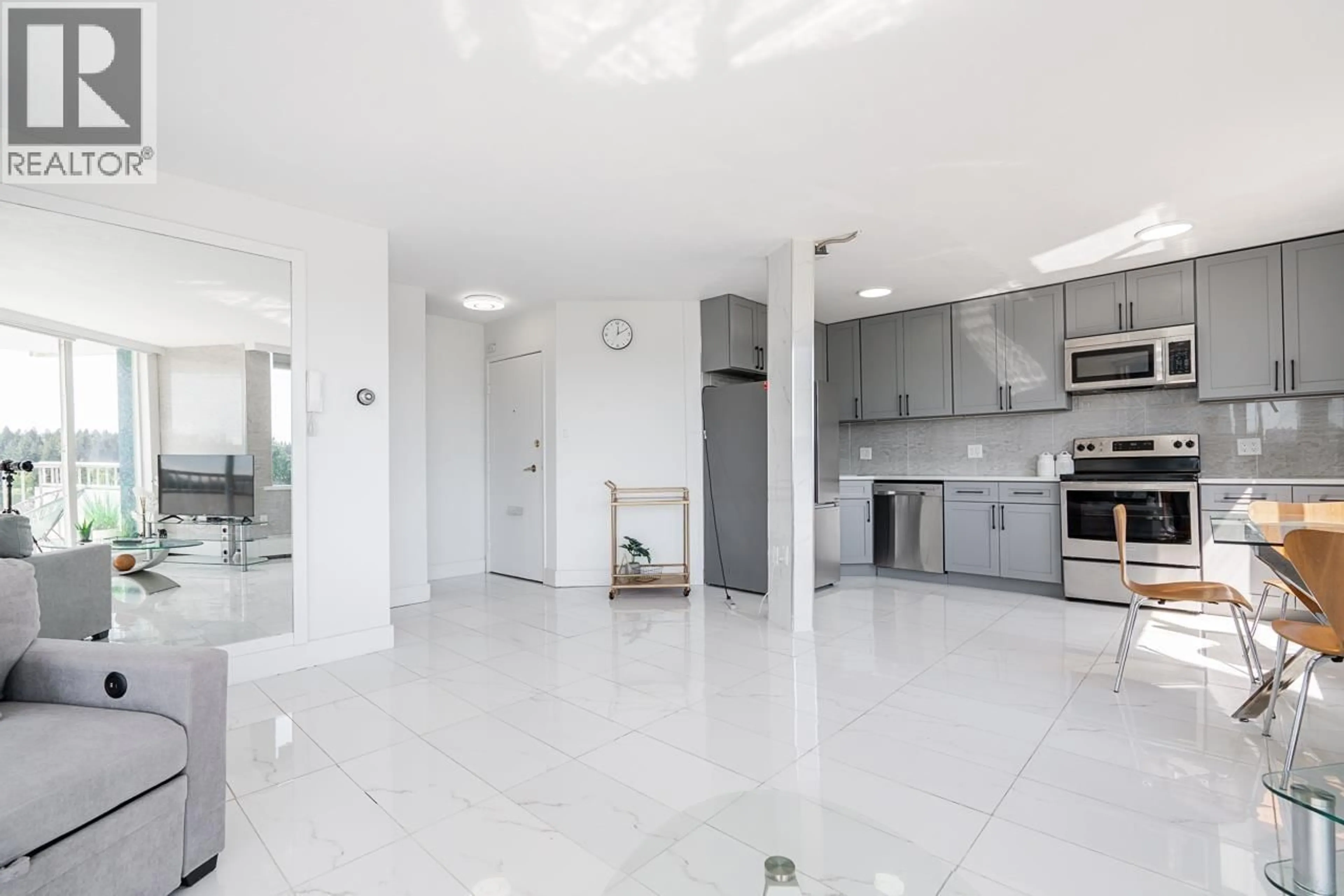 Open concept kitchen, ceramic/tile floor for 903 - 4691 10TH AVENUE, Vancouver British Columbia V6R2J3