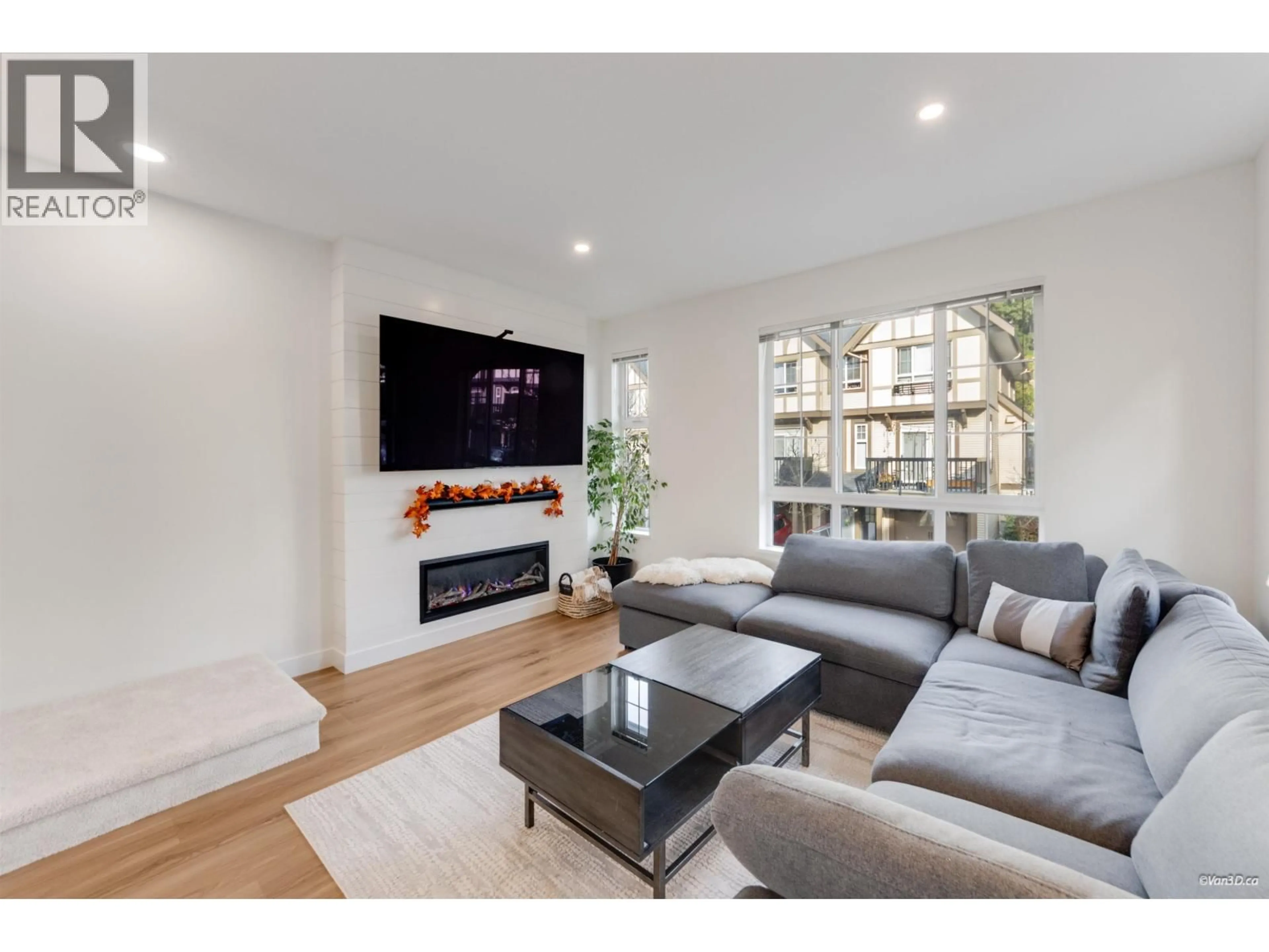 Living room with furniture, wood/laminate floor for 53 - 1338 HAMES CRESCENT, Coquitlam British Columbia V3E0J2