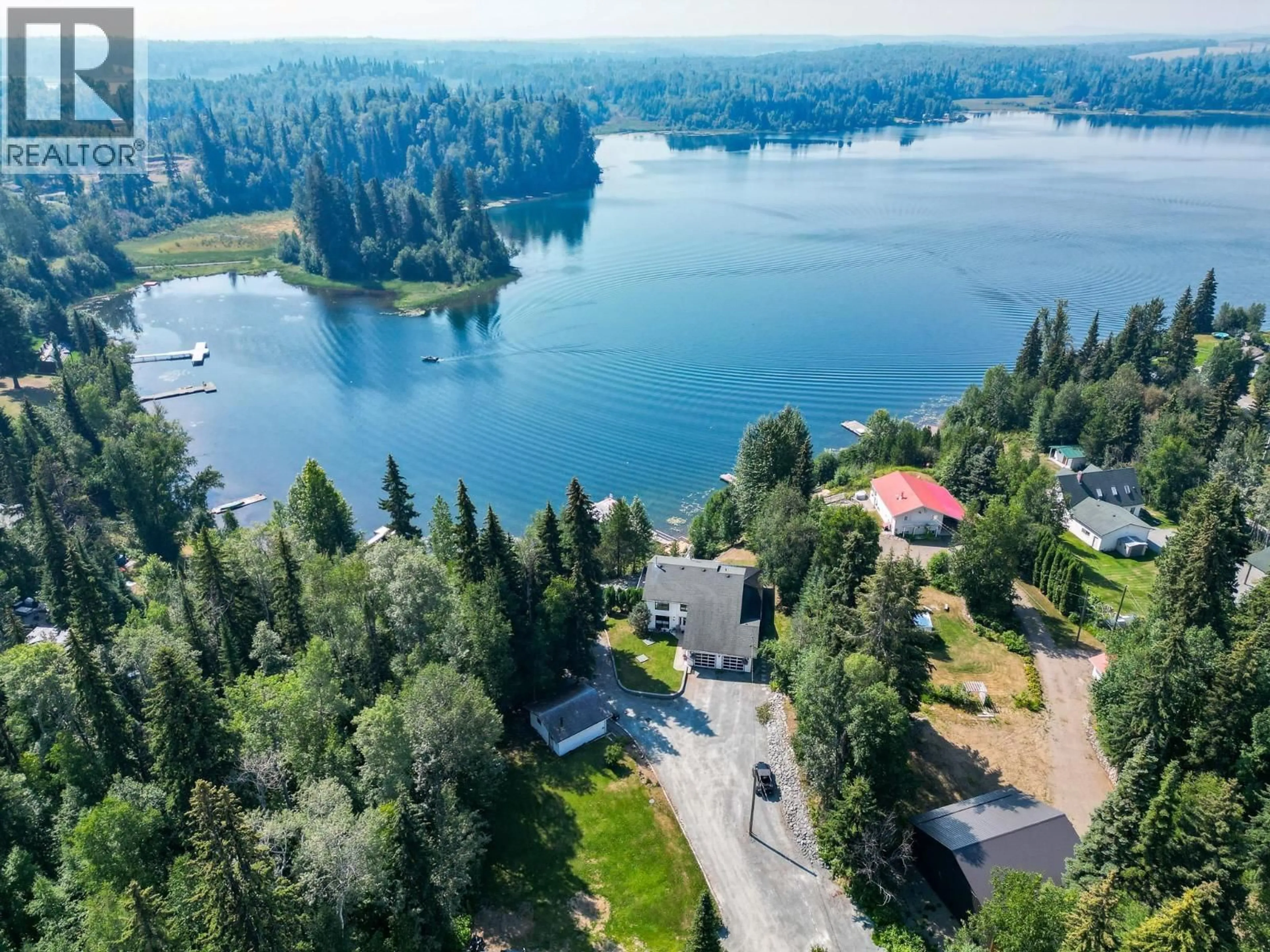 A pic from outside/outdoor area/front of a property/back of a property/a pic from drone, water/lake/river/ocean view for 13010 LAKESIDE DRIVE, Prince George British Columbia V2K5M7
