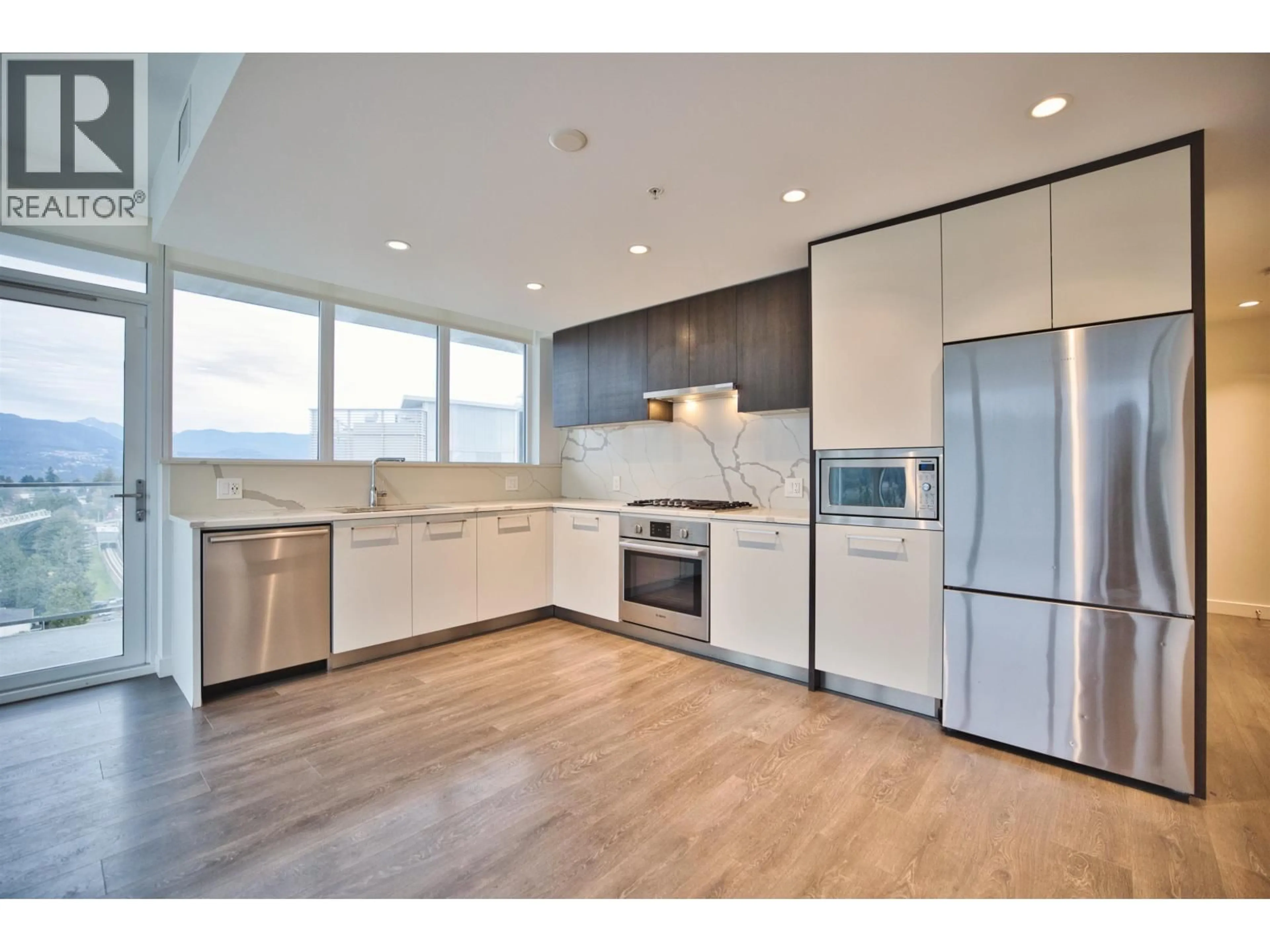 Open concept kitchen, unknown for 1604 - 567 CLARKE ROAD, Coquitlam British Columbia V3J0K7