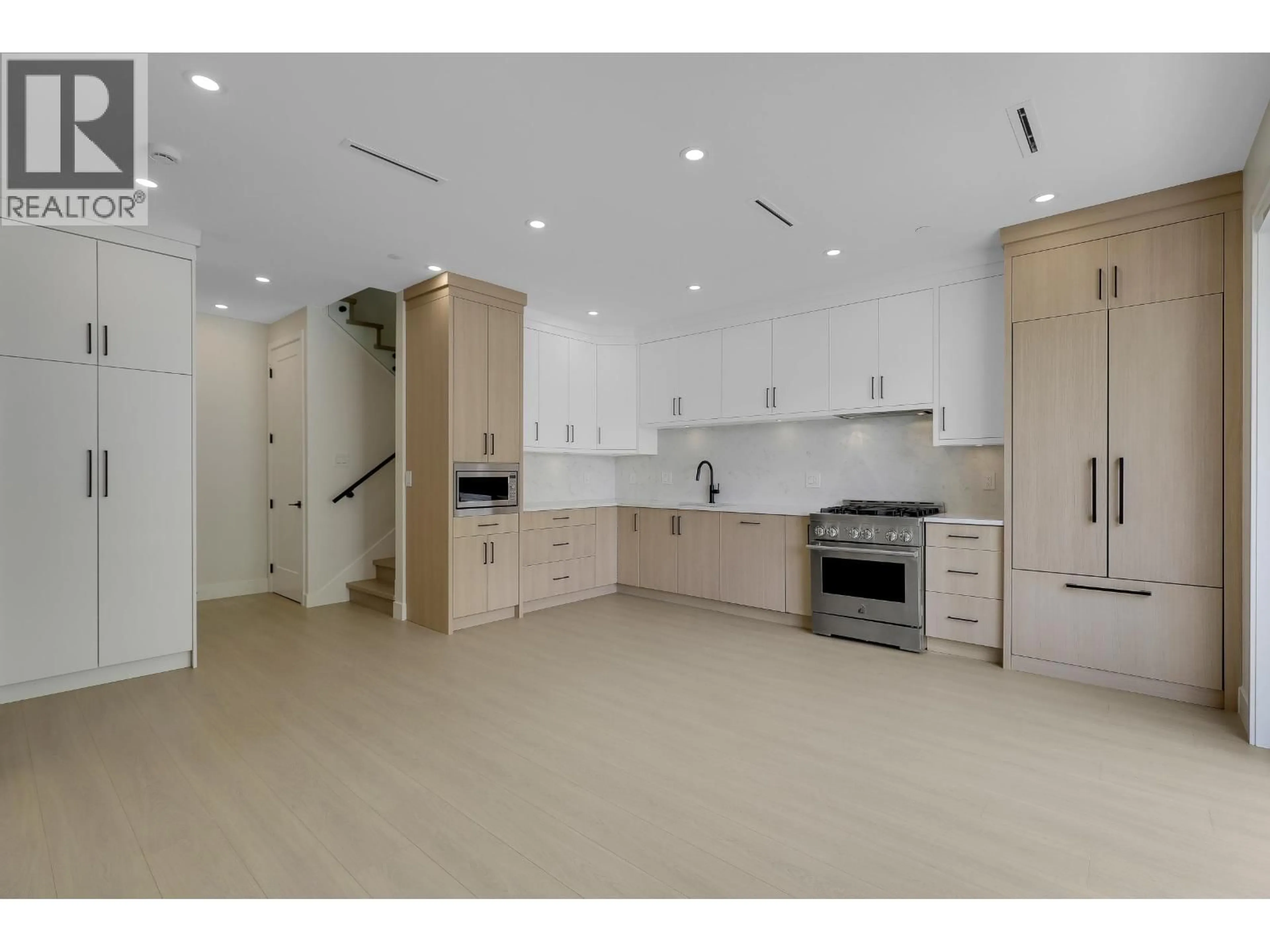 Open concept kitchen, ceramic/tile floor for 1 - 3695 26 AVENUE, Vancouver British Columbia V5R2M7