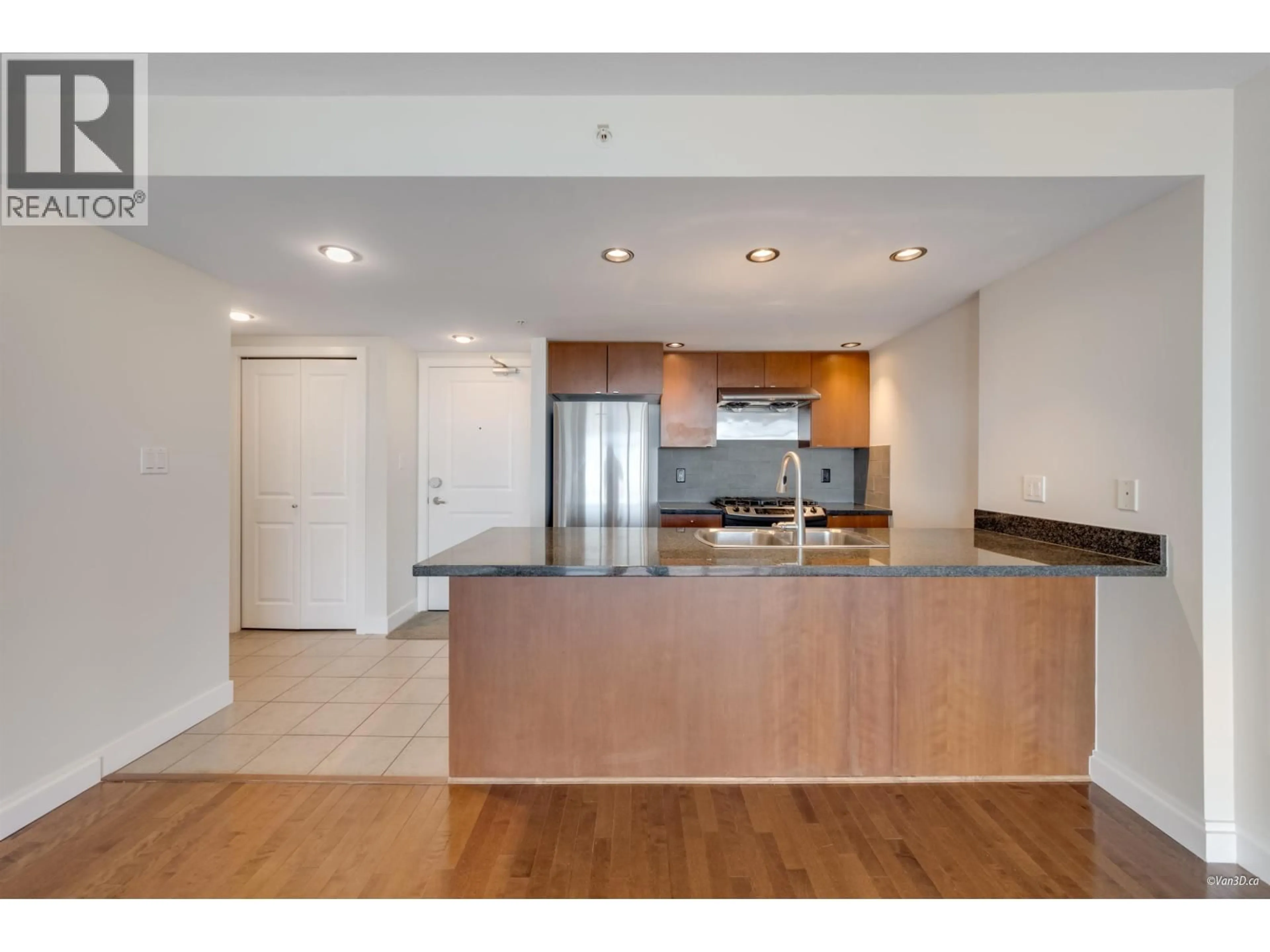 Open concept kitchen, wood/laminate floor for 1707 - 9188 HEMLOCK DRIVE, Richmond British Columbia V6Y4J7