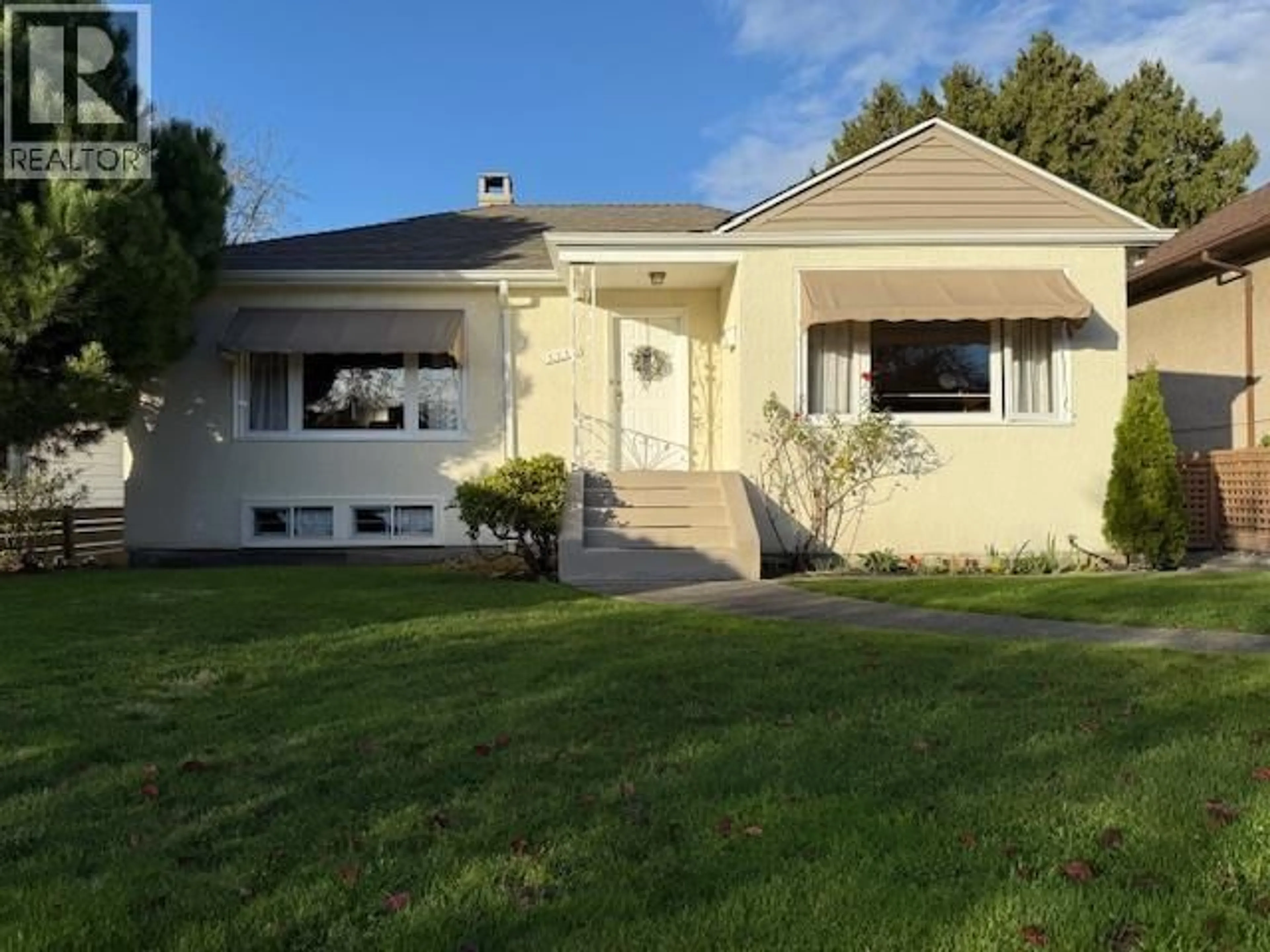 Home with vinyl exterior material, street for 2225 22ND AVENUE, Vancouver British Columbia V6L1L6