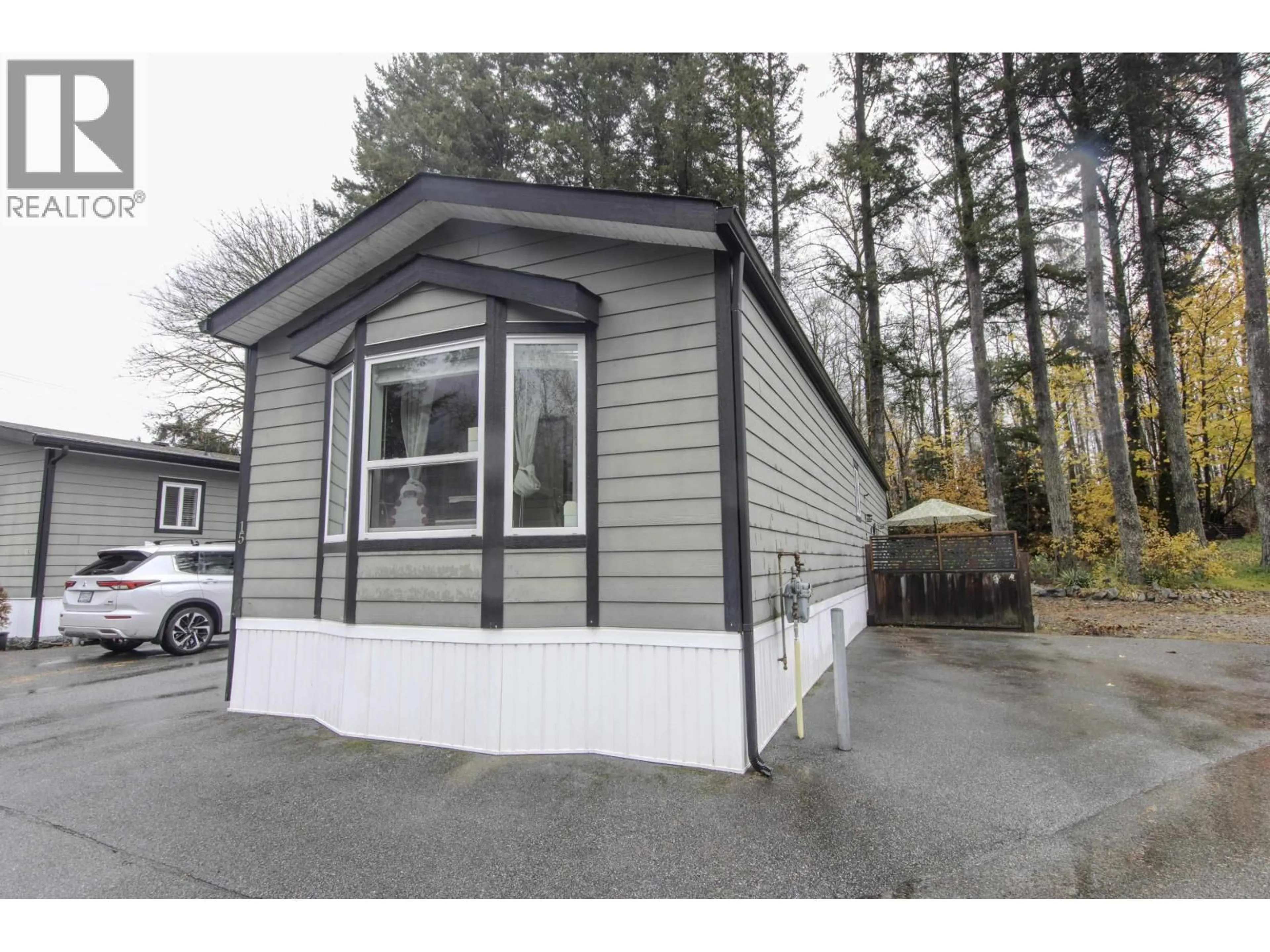 Home with vinyl exterior material, street for 15 - 39884 GOVERNMENT ROAD, Squamish British Columbia V8B0A1