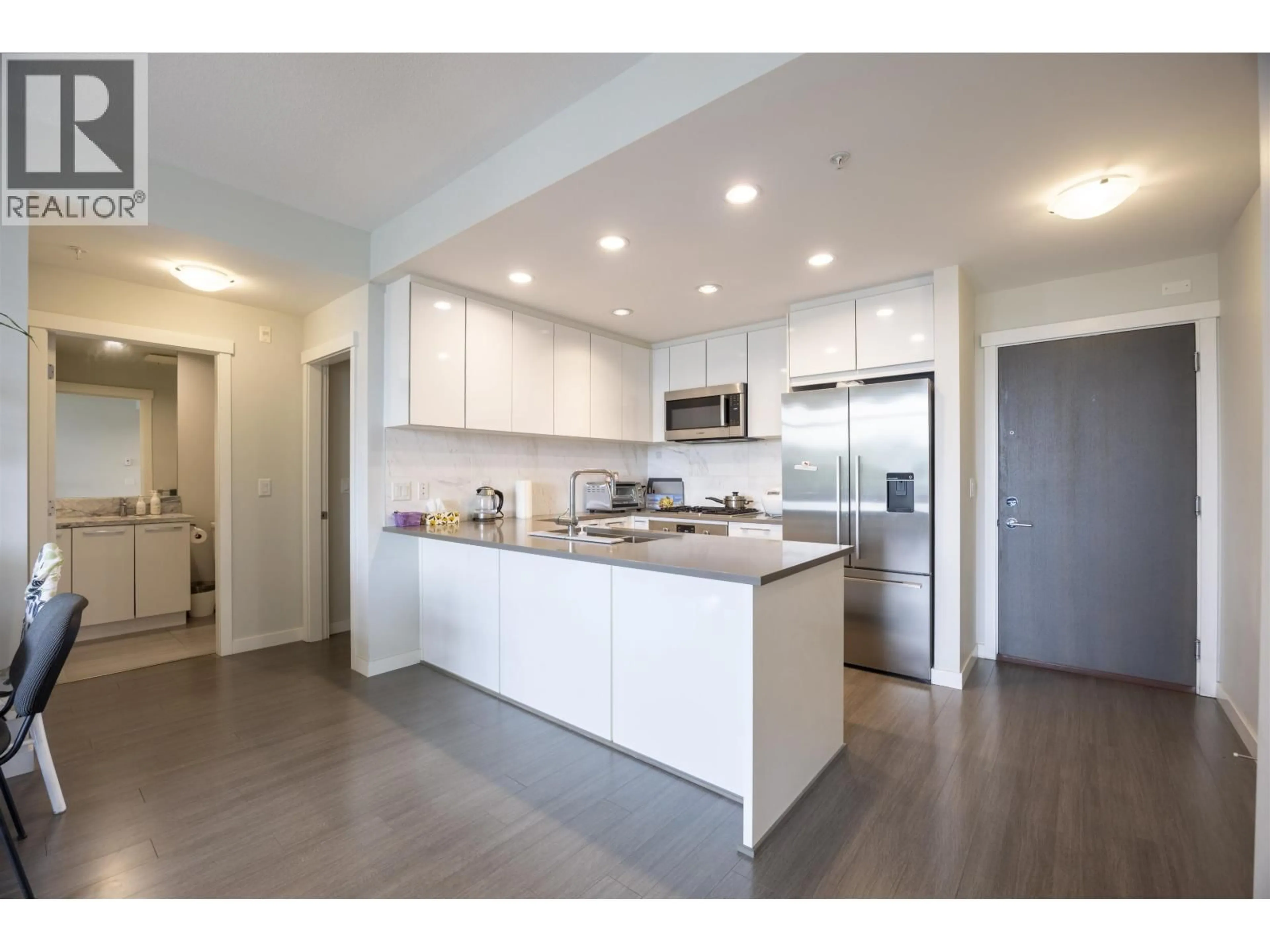 Open concept kitchen, unknown for 406 - 3263 PIERVIEW CRESCENT, Vancouver British Columbia V5S0C3