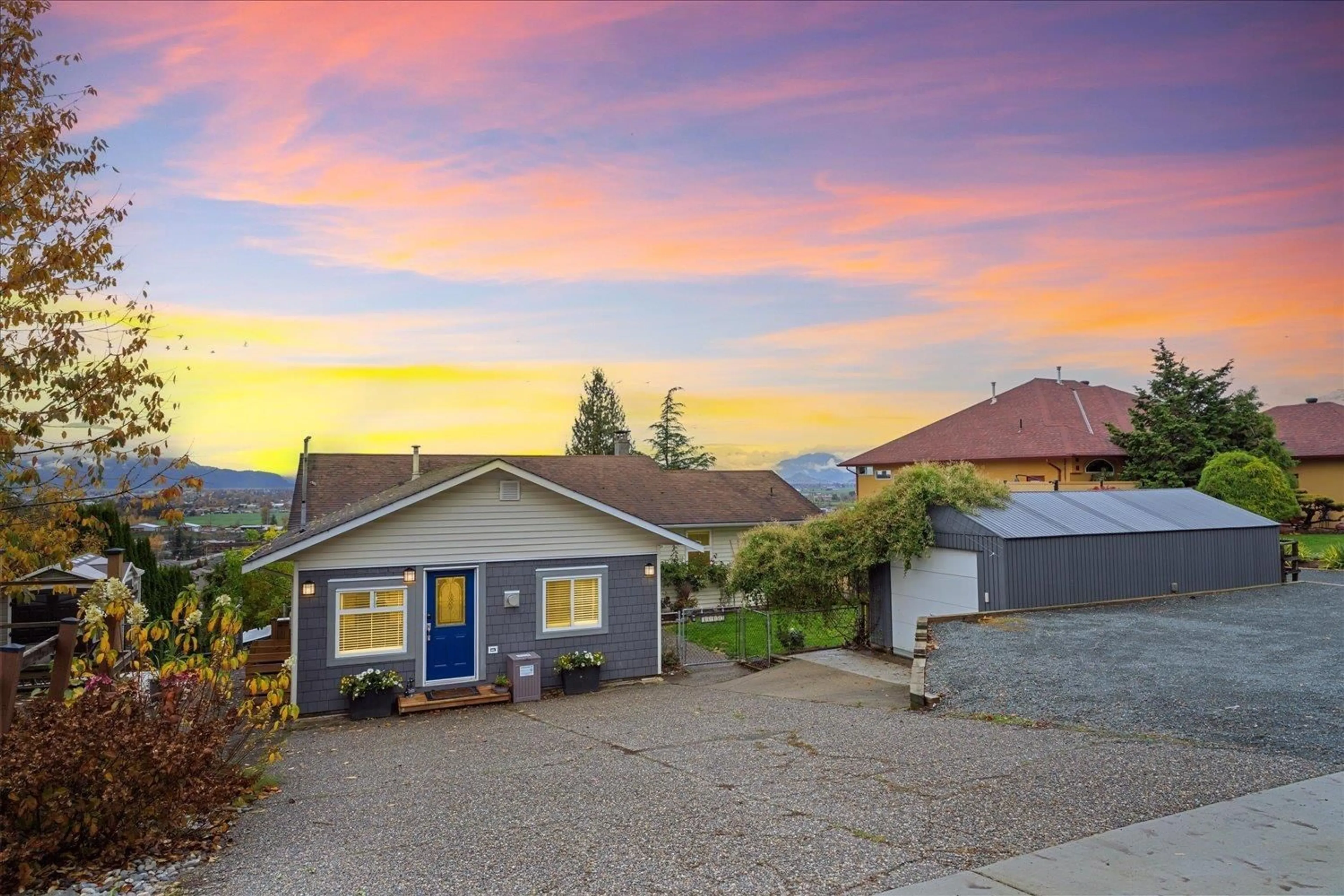 A pic from outside/outdoor area/front of a property/back of a property/a pic from drone, street for 46455 UPLANDS ROAD, Chilliwack British Columbia V2R4W1