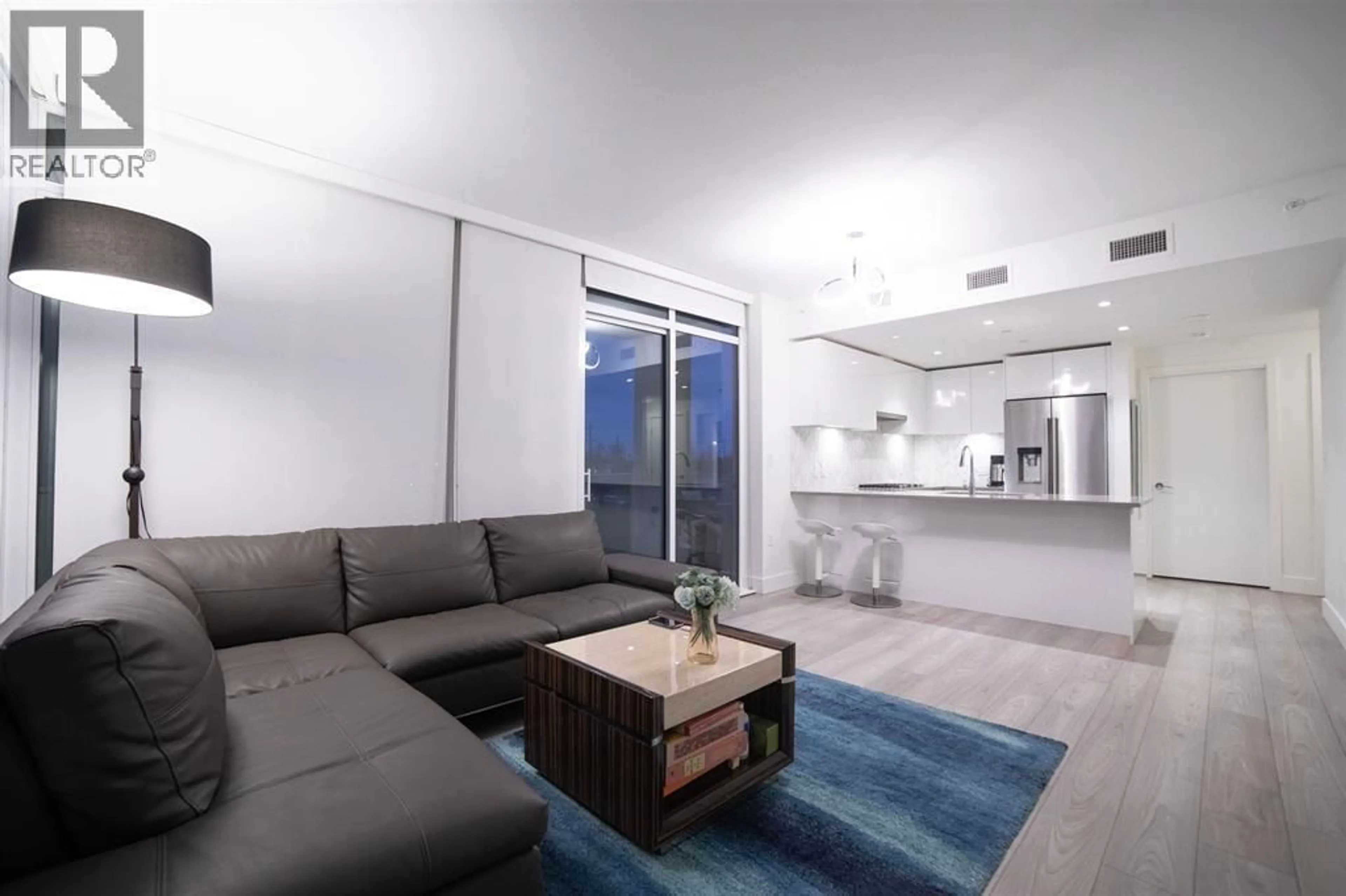 Living room with furniture, unknown for 201 - 3581 KENT AVENUE, Vancouver British Columbia V5S0H6